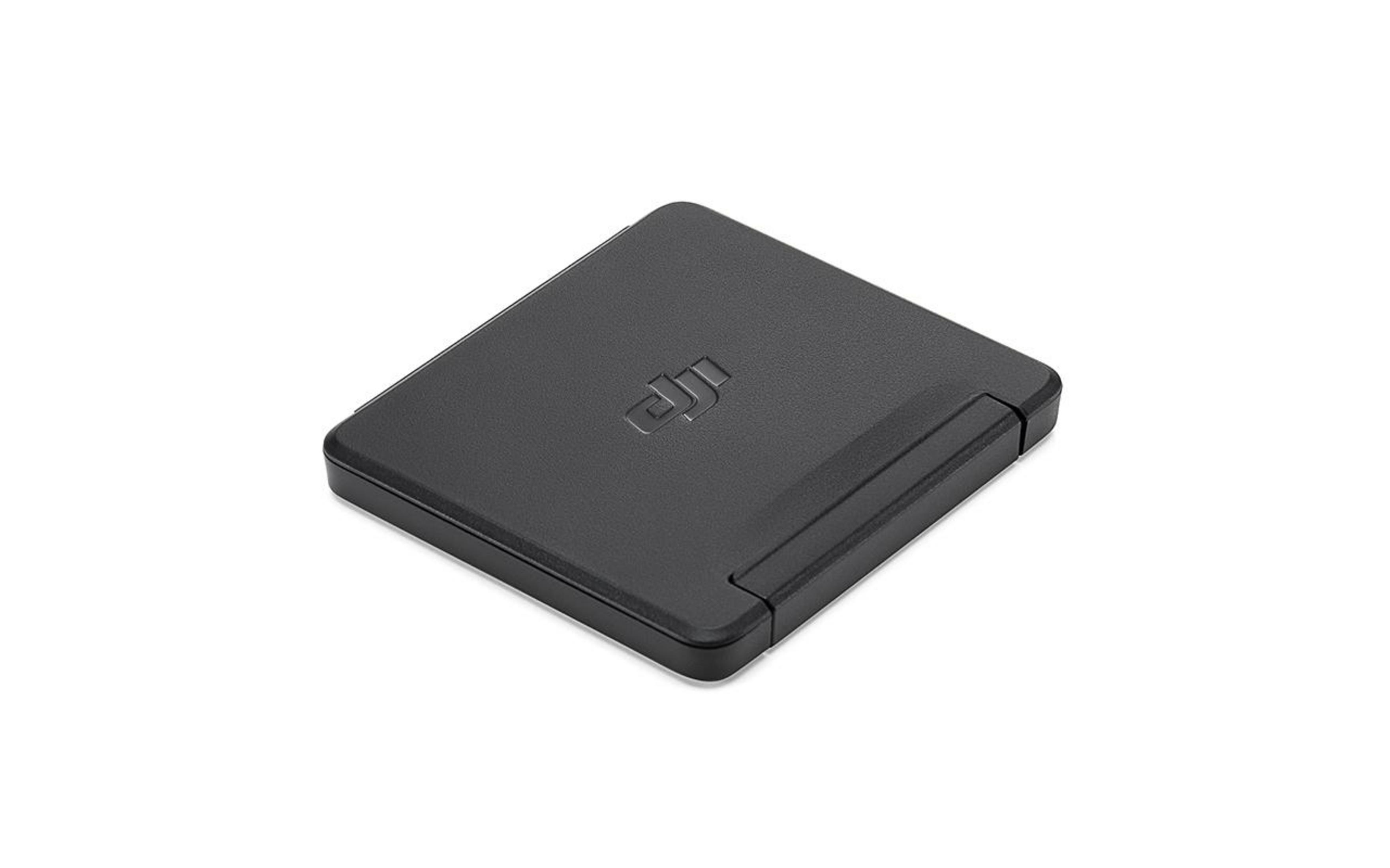 Custodia quadrata nera per prodotti DJI con logo DJI in rilievo sulla parte superiore. Sfondo bianco.