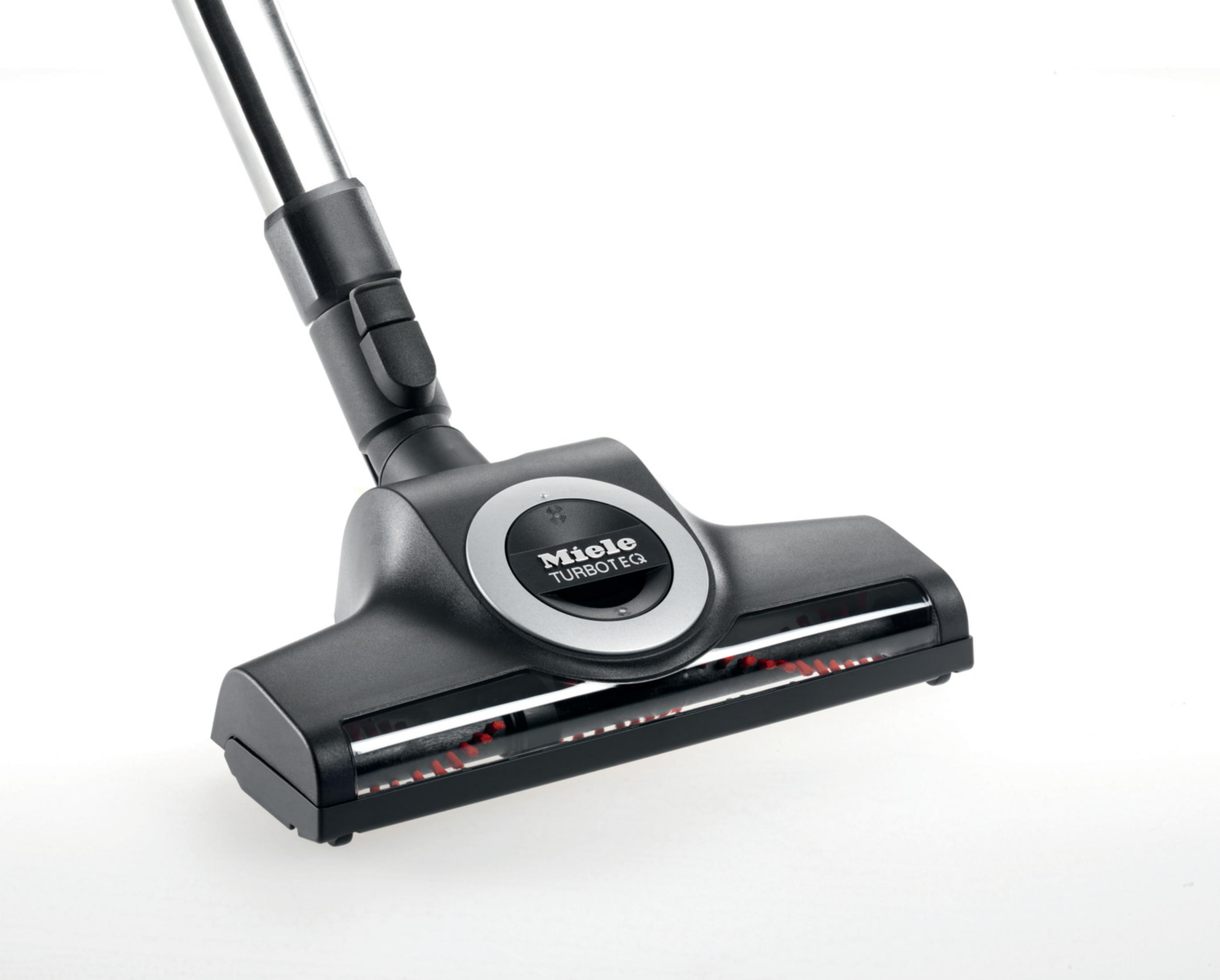 Zbliżenie czarnej głowicy odkurzacza Miele na białym tle. Widoczna nazwa marki.