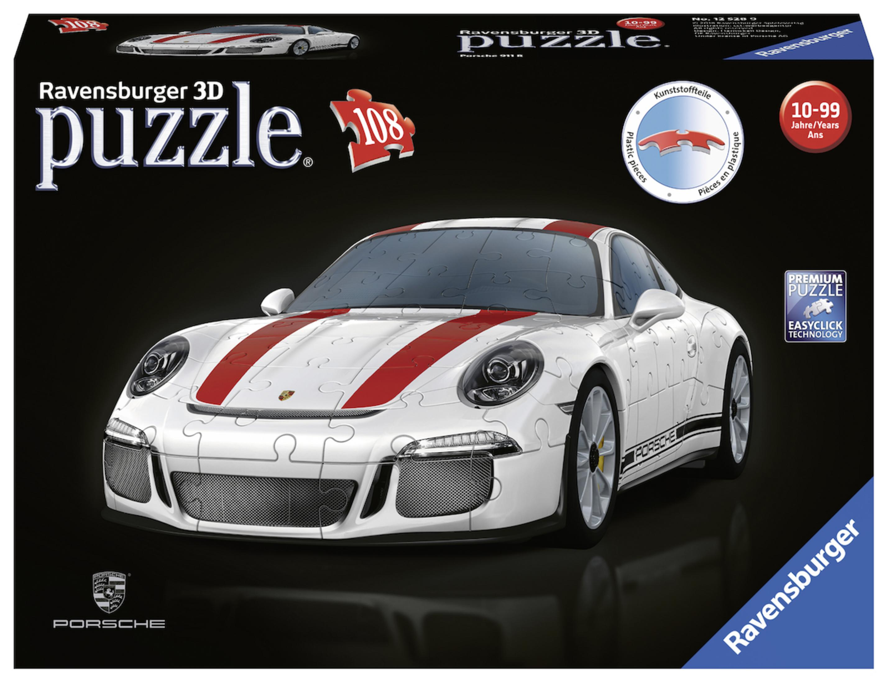 Pudełko z puzzlami 3D Ravensburger Porsche 911. Białe Porsche z czerwonymi paskami na czarnym tle.
