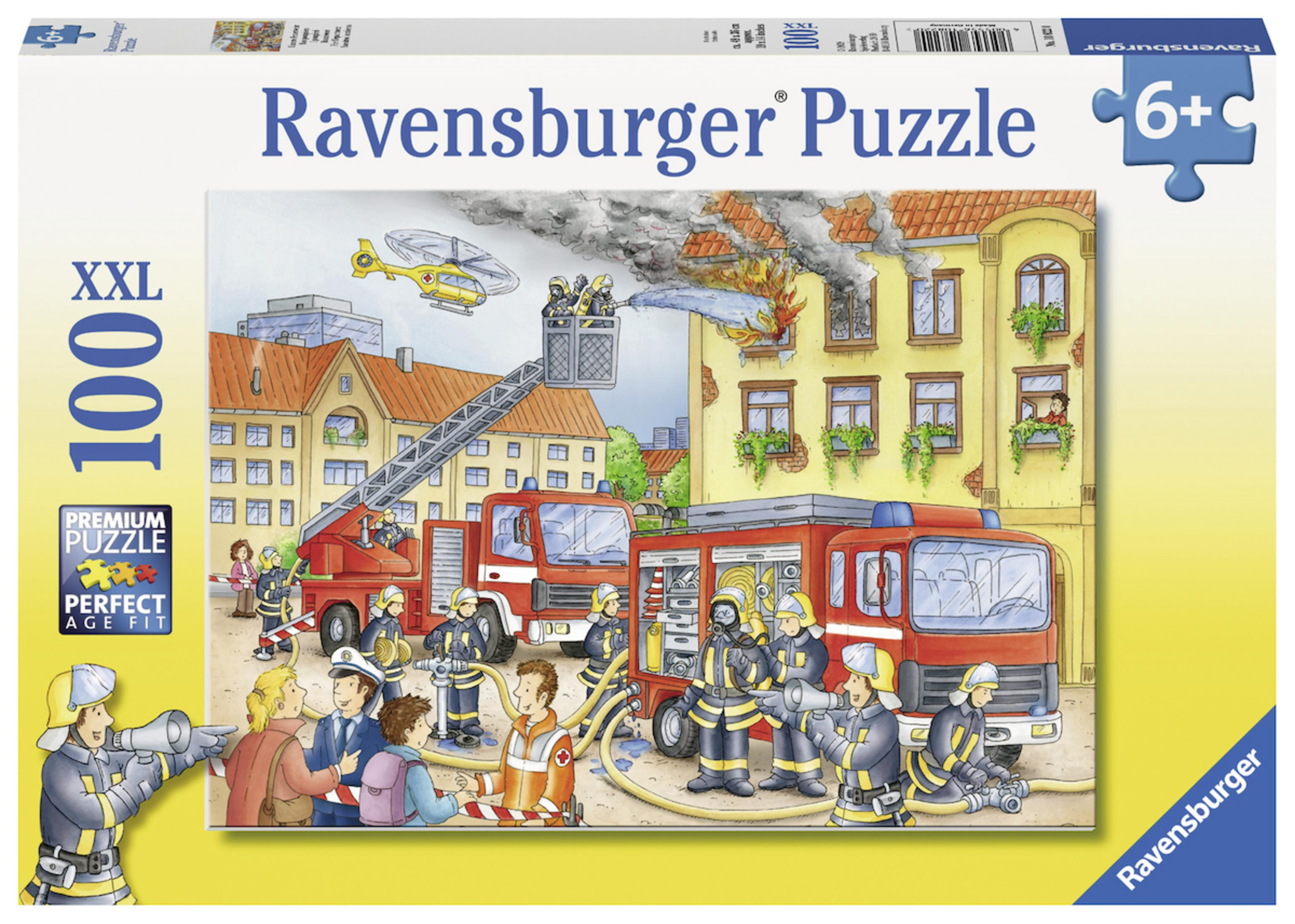 Ravensburger Puzzle Box. Feuerwehrleute an einem Brandort. Rote Feuerwehrautos, brennendes Gebäude, Leute und ein Helikopter.