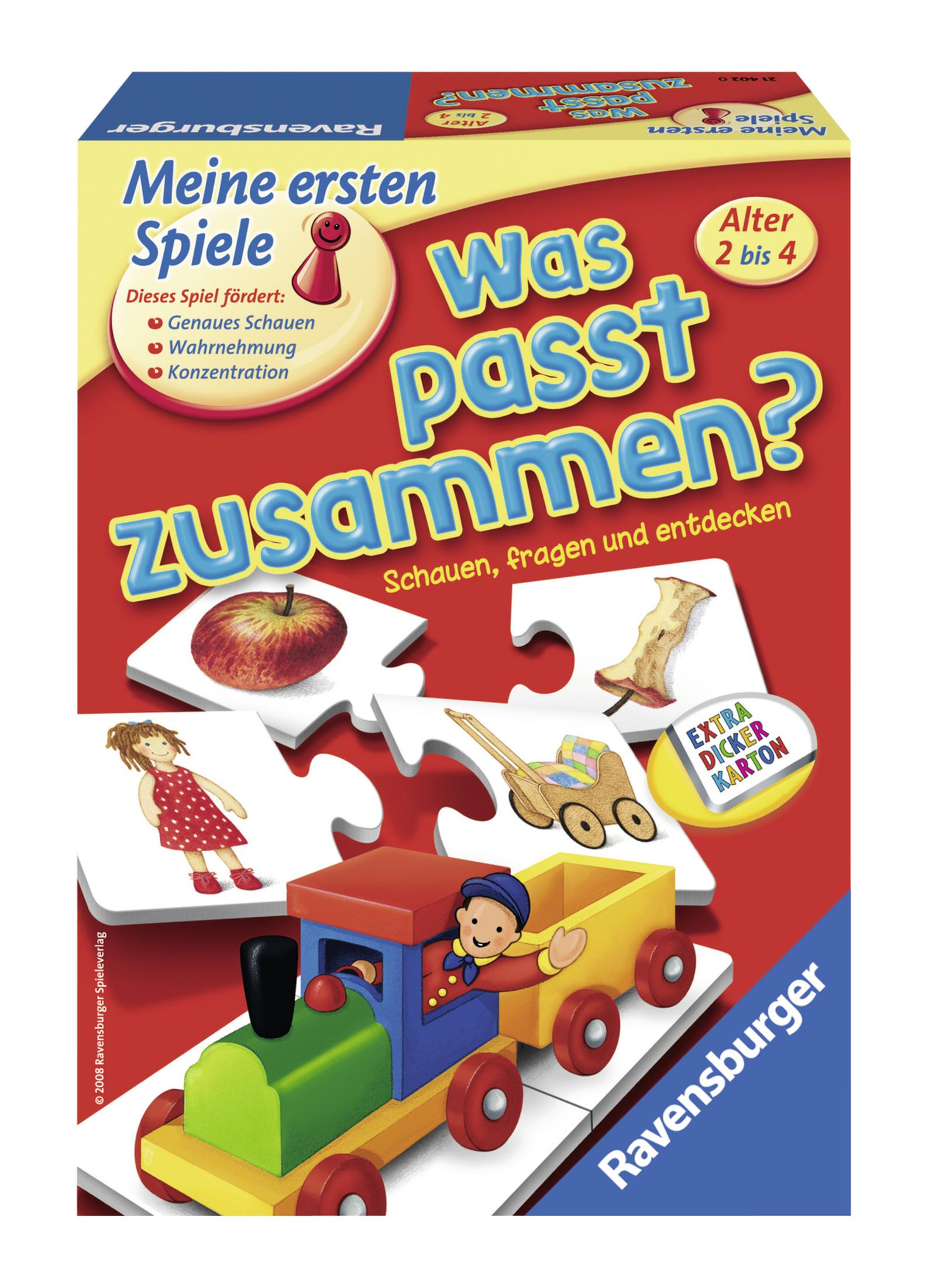 Schachtel eines Kinderspiels mit einem Zug, Apfel und anderen Puzzleteilen.