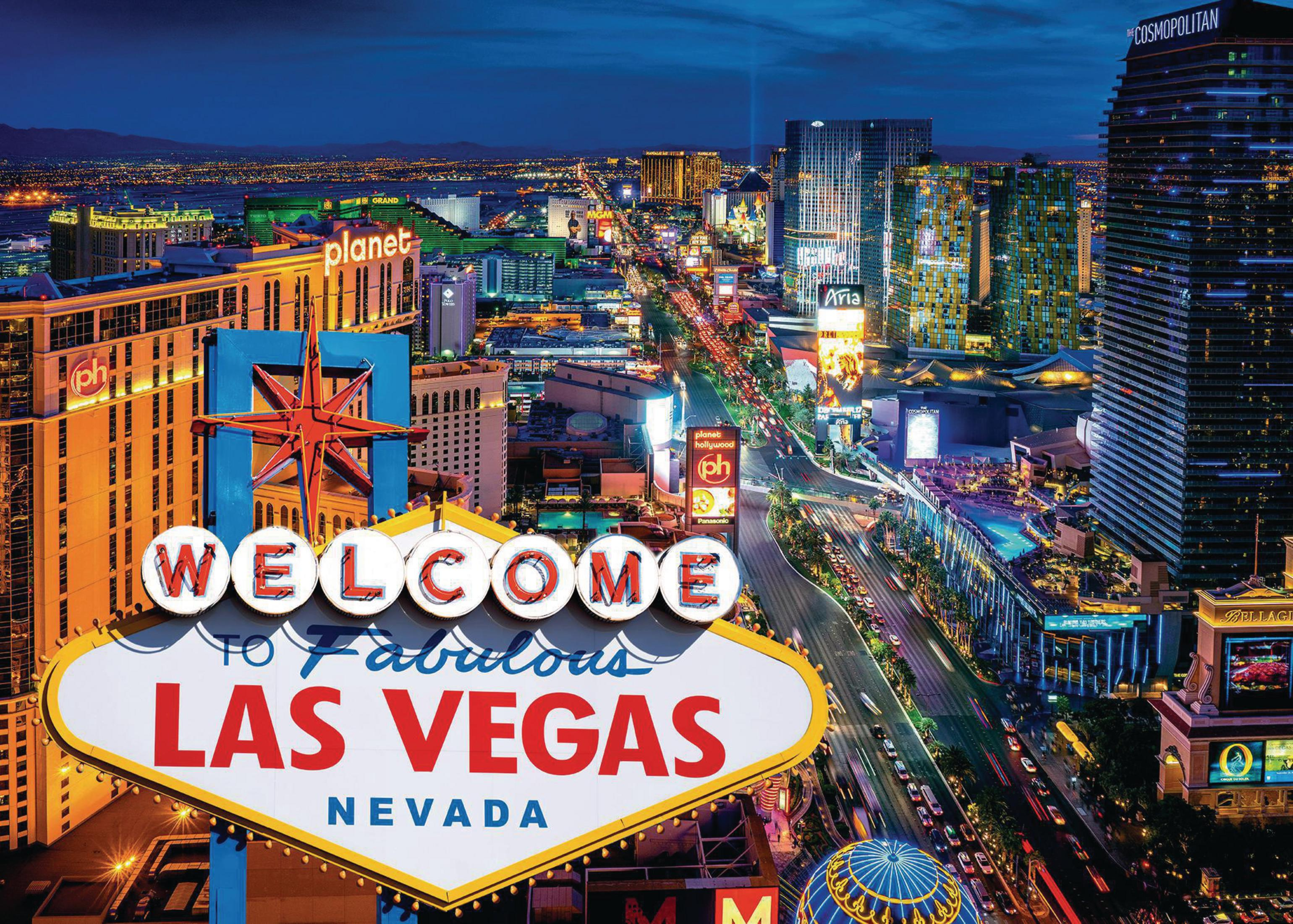 Nachtansicht von Las Vegas, mit dem Willkommen in Fabulous Las Vegas-Schild im Vordergrund.