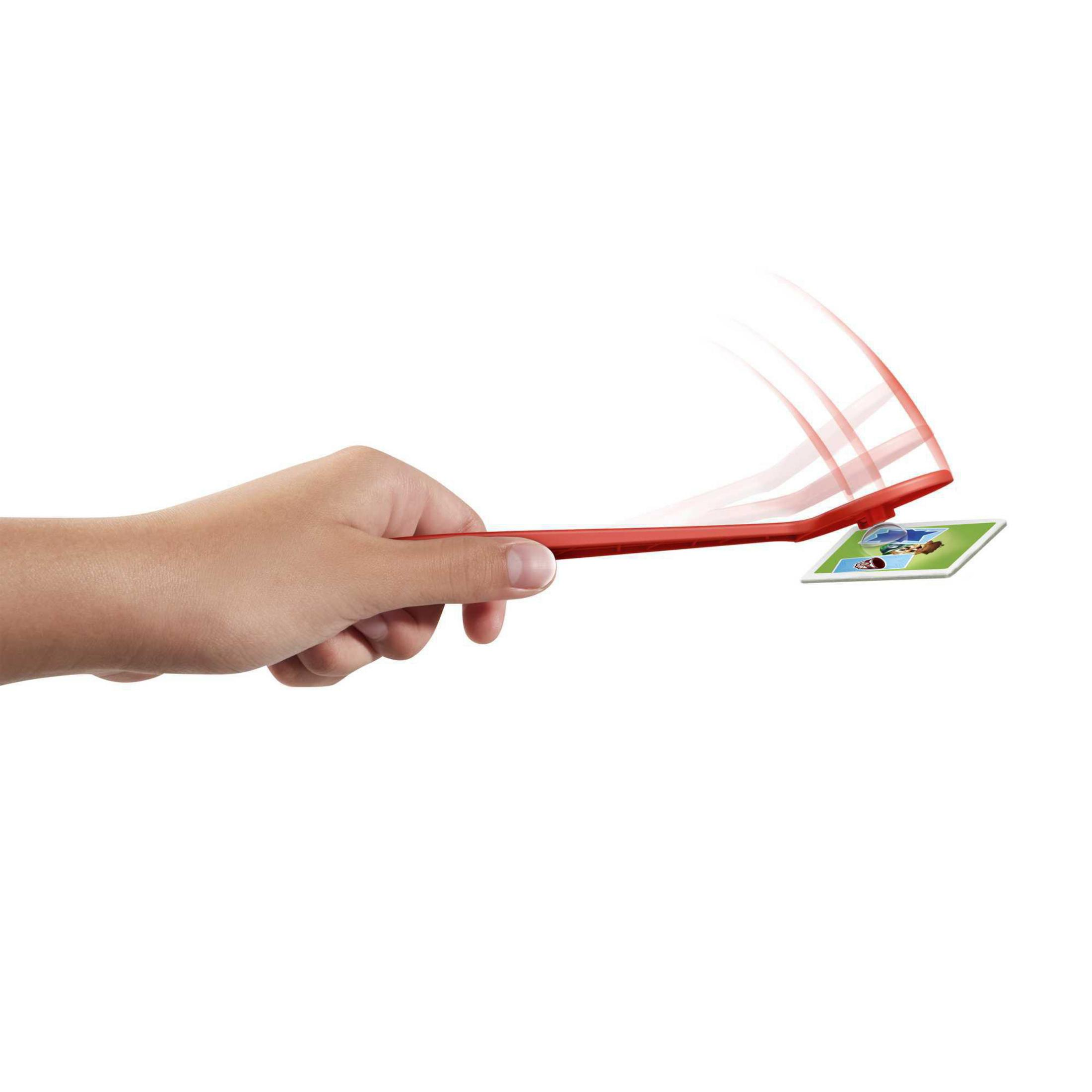 Eine Hand hält ein rotes Paddel und bewegt eine kleine Spielkachel.