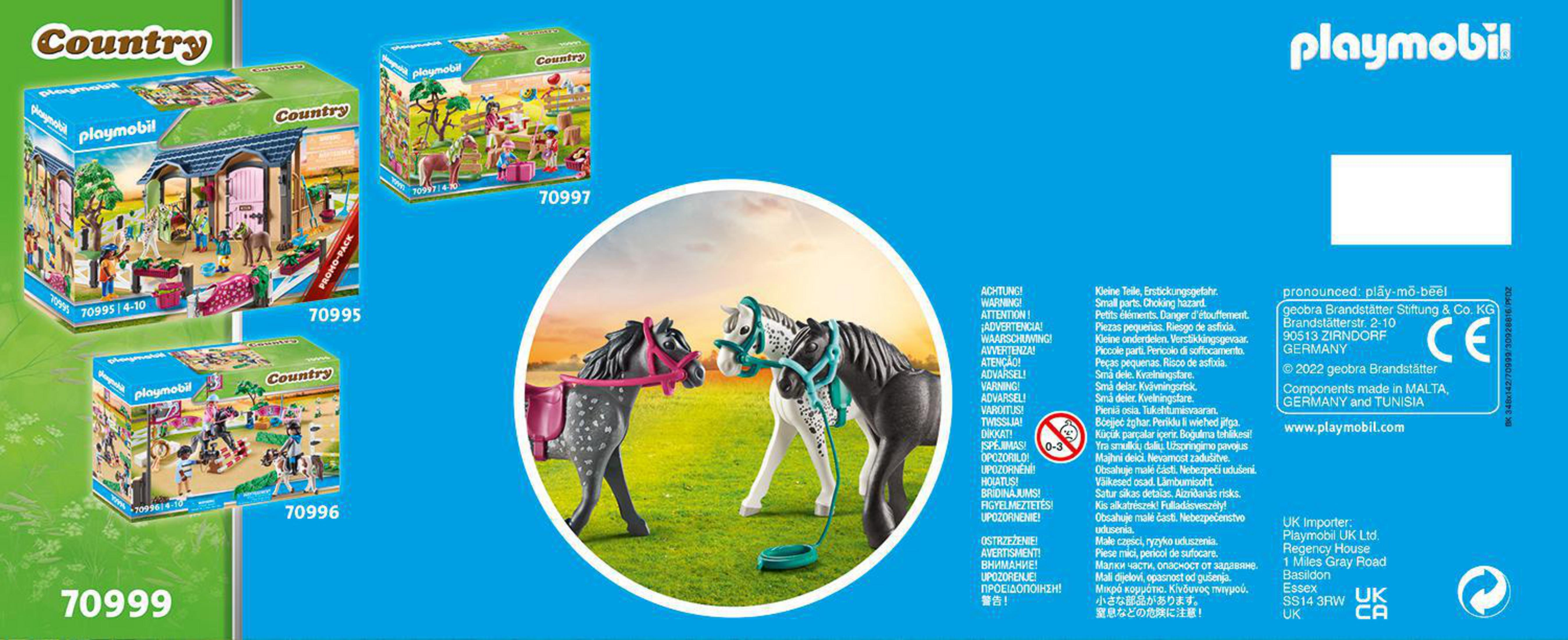 Playmobil Country Box mit einem Pferdestall und Pferdefiguren.