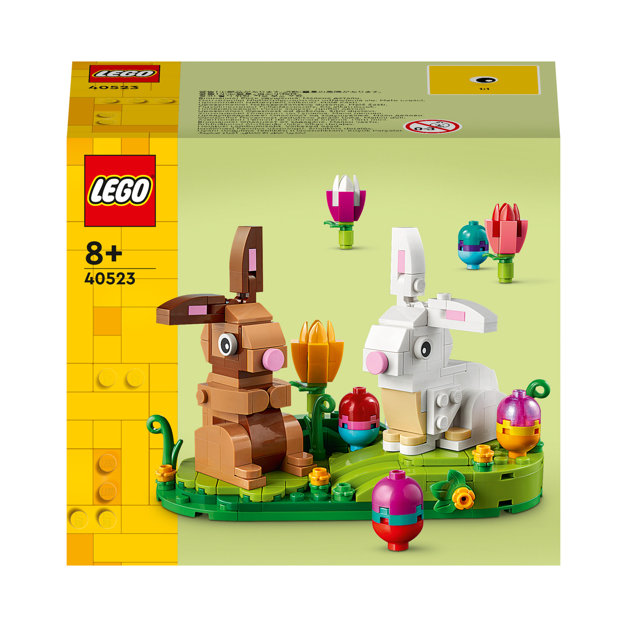 LEGO Paskalya seti kutusu. Yeşil ve sarı bir arka plan üzerinde iki tavşan, çiçek ve Paskalya yumurtası içerir.