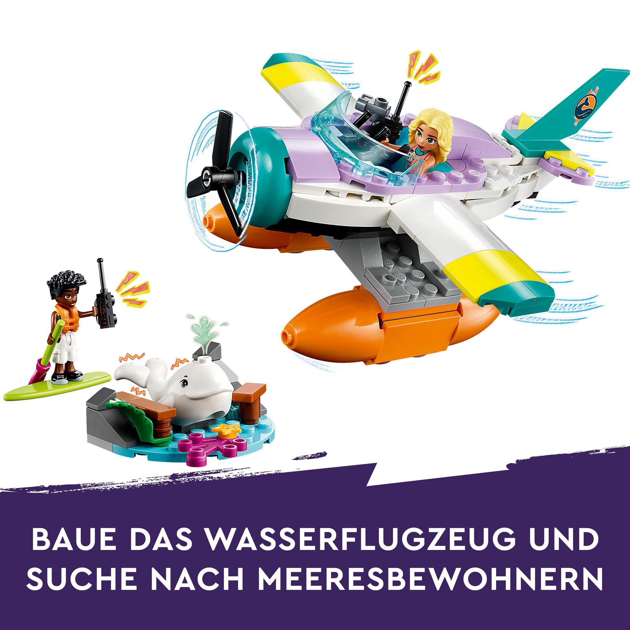 Ensemble Lego avec un avion et un dauphin, et deux figurines. L'avion est violet et blanc.