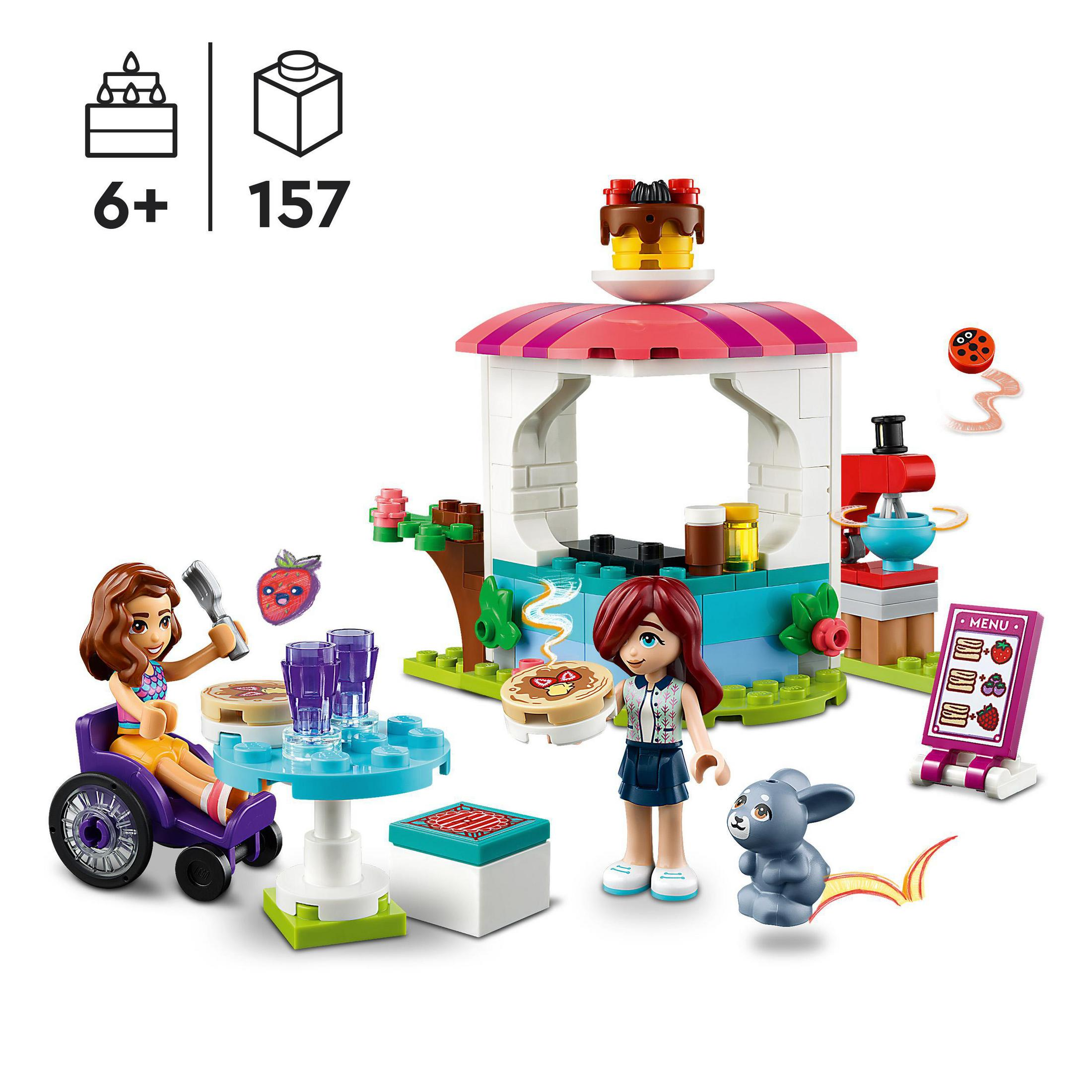 İki figür, küçük bir dükkan ve aksesuarlarla bir Lego Friends seti.