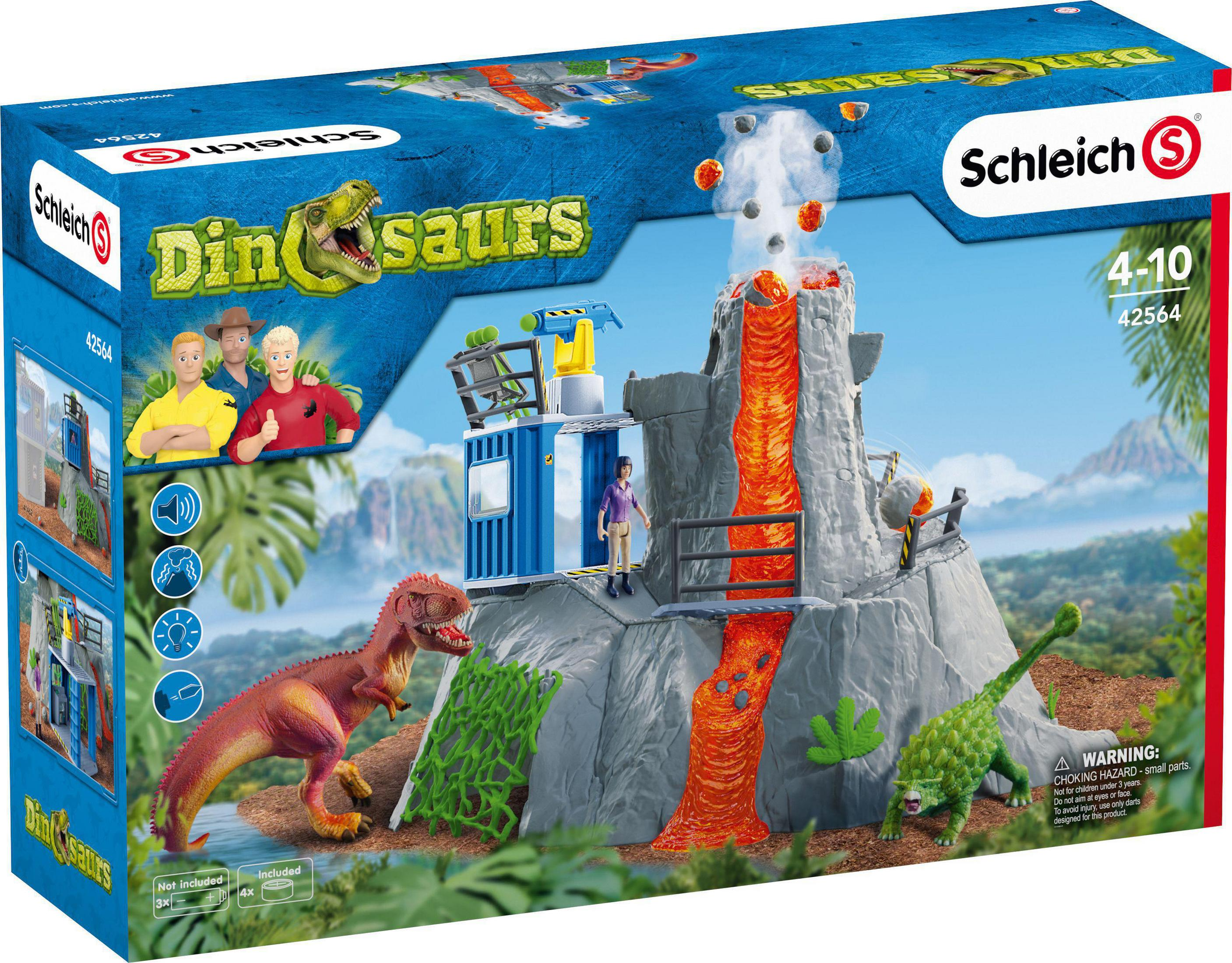 Set di giocattoli di dinosauri in scatola con un vulcano, dinosauri e personaggi, che promuove un ambiente di gioco per bambini.