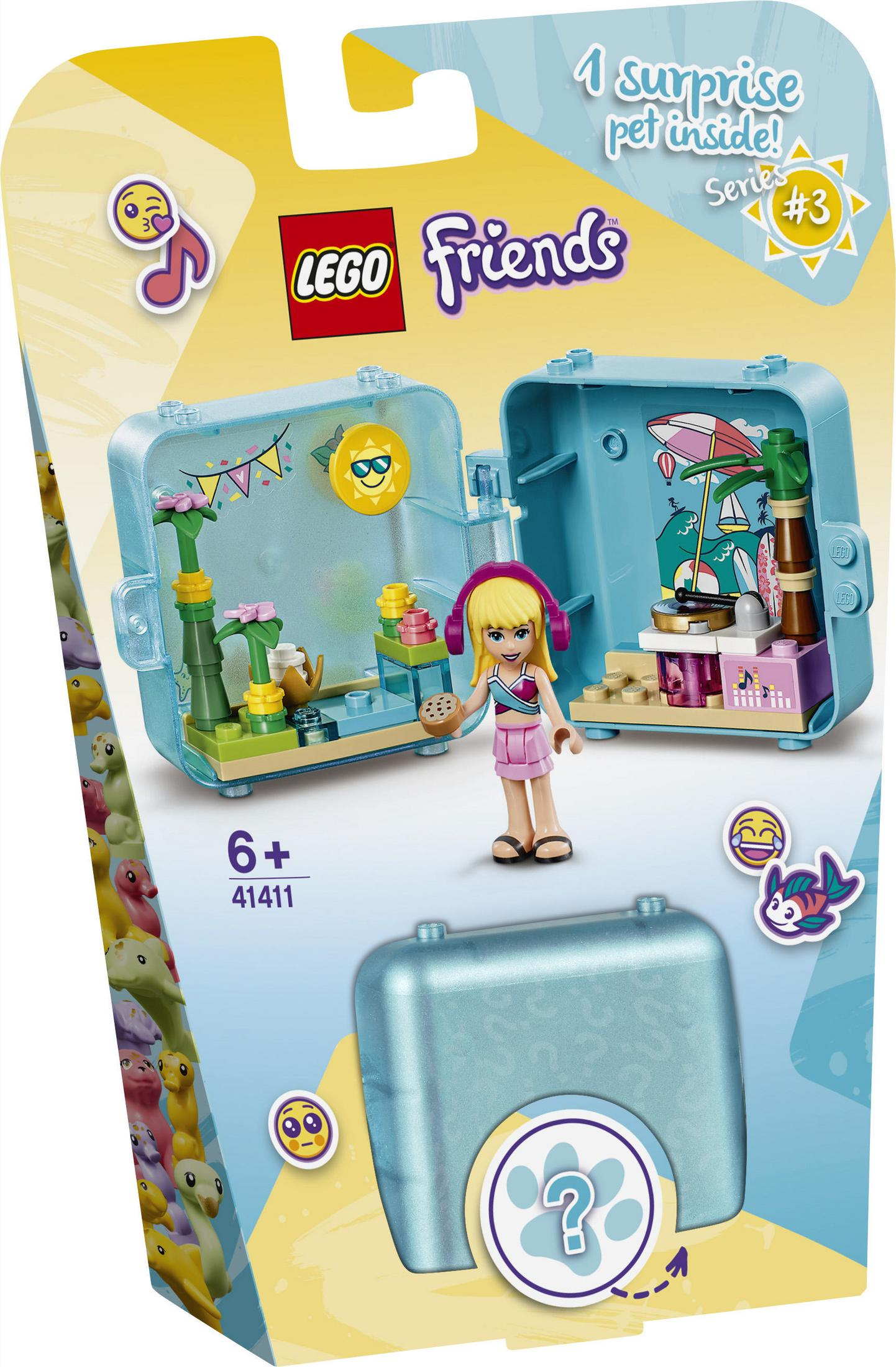 Pudełko Lego Friends, otwarte, pokazuje figurkę lalki i miniaturowe sceny. Pudełko jest jasnoniebieskie.