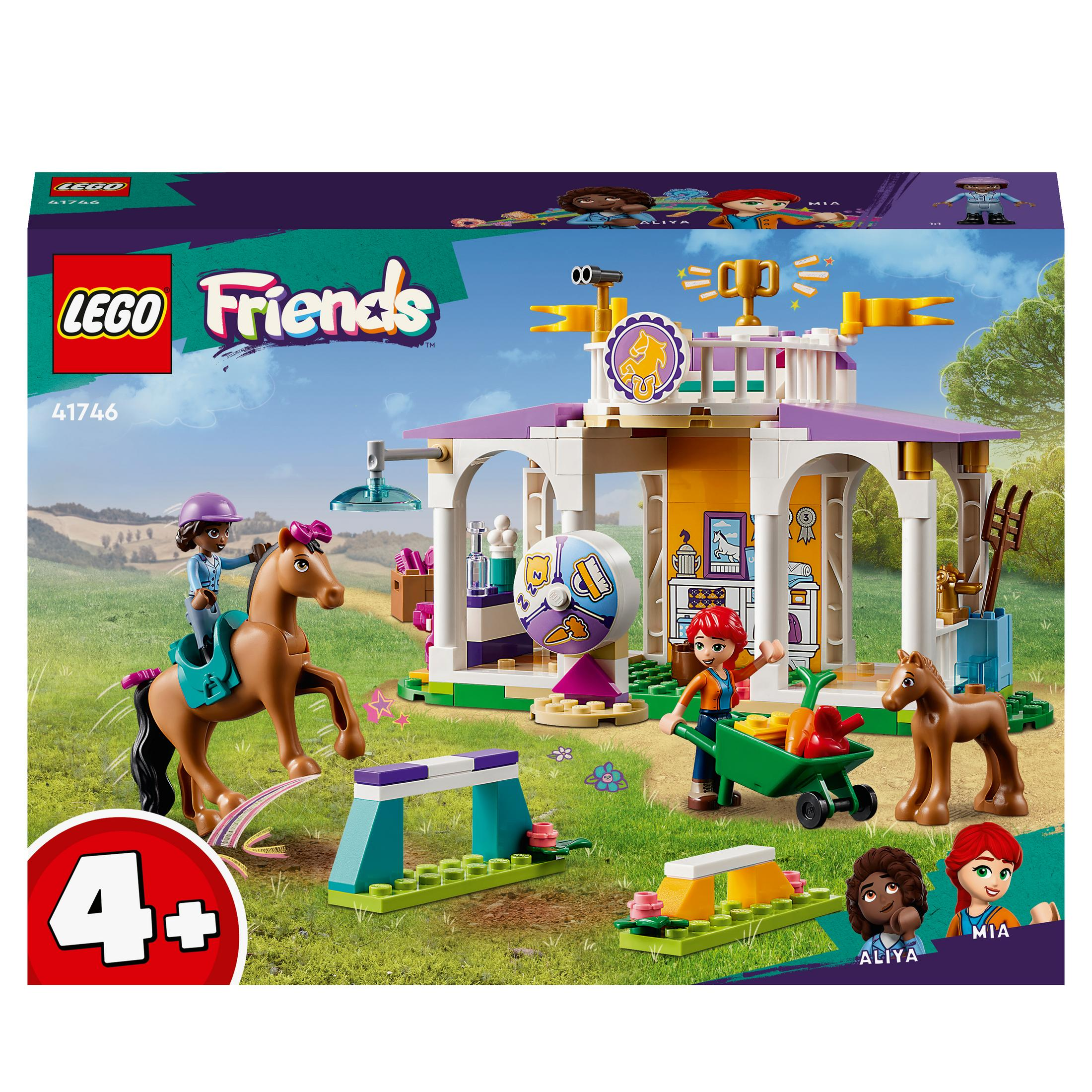 Lego-Set mit Pferden, Figuren und einem Stall.