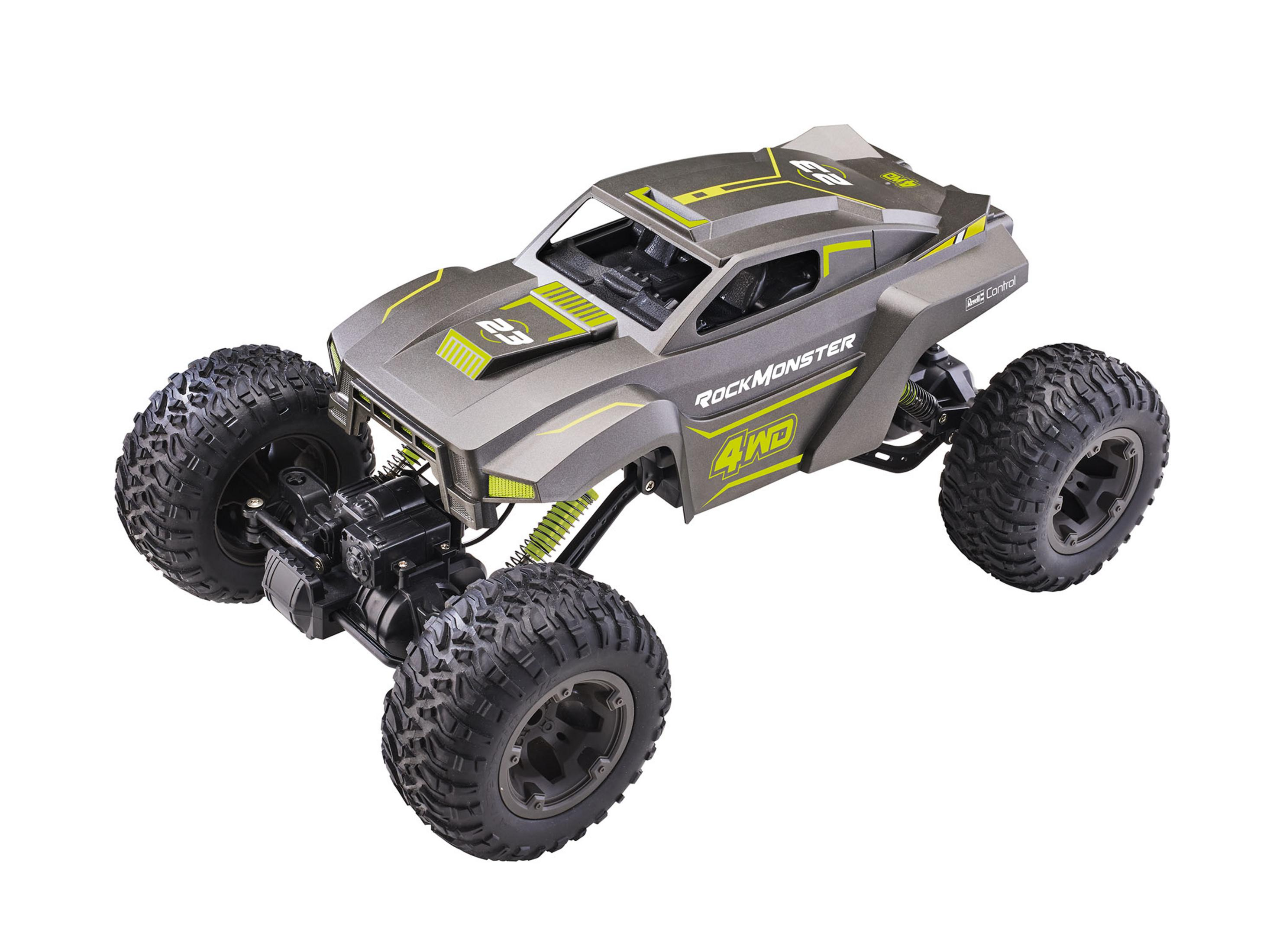 Graues und gelbes ferngesteuertes Rock Monster Spielzeugauto mit großen Reifen auf weißem Grund.