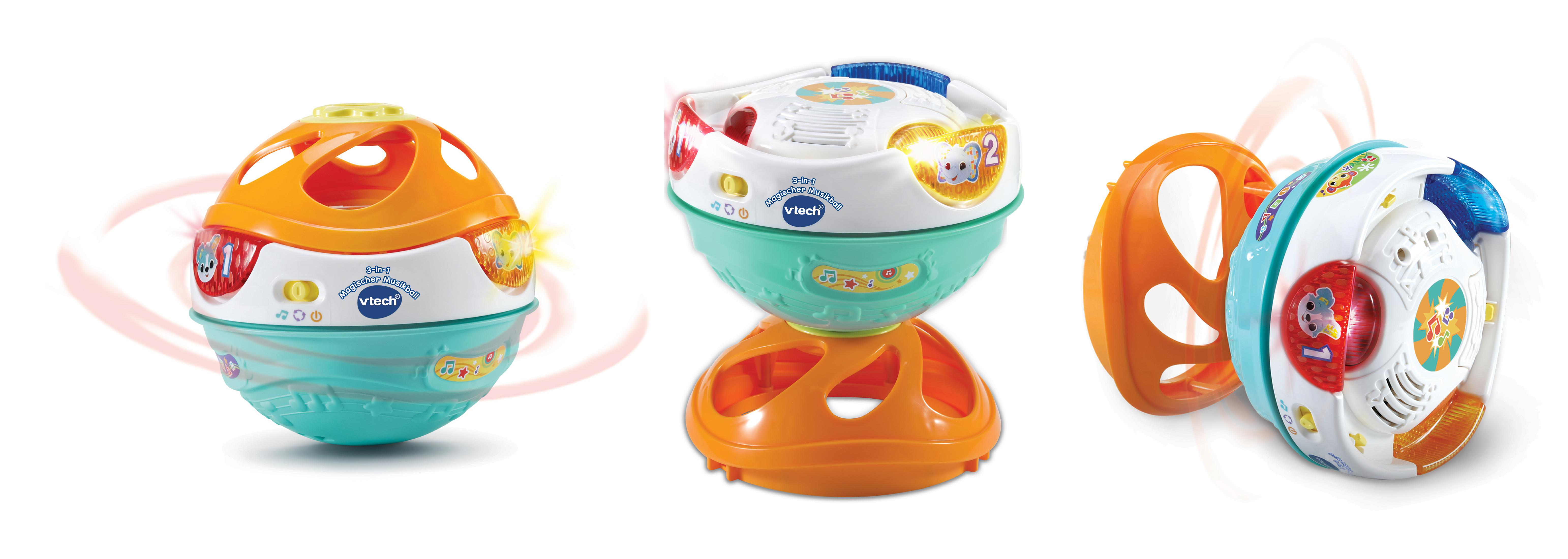 Drei bunte Babyspielzeuge. Jedes ist rund, mit Lichtern und Knöpfen. Orange, weiß, grün.