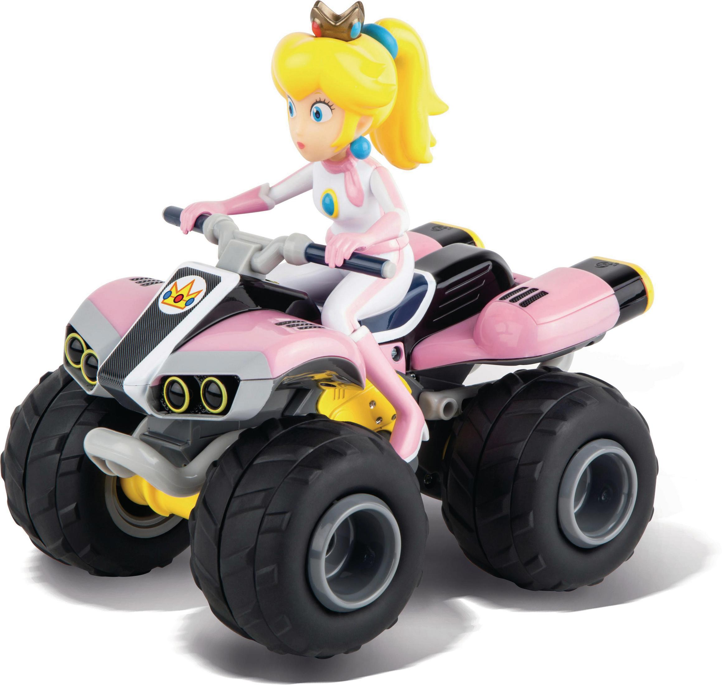 Prinzessin Peach auf einem rosa ATV-Spielzeug. Sie trägt Rosa und Weiß mit Krone.