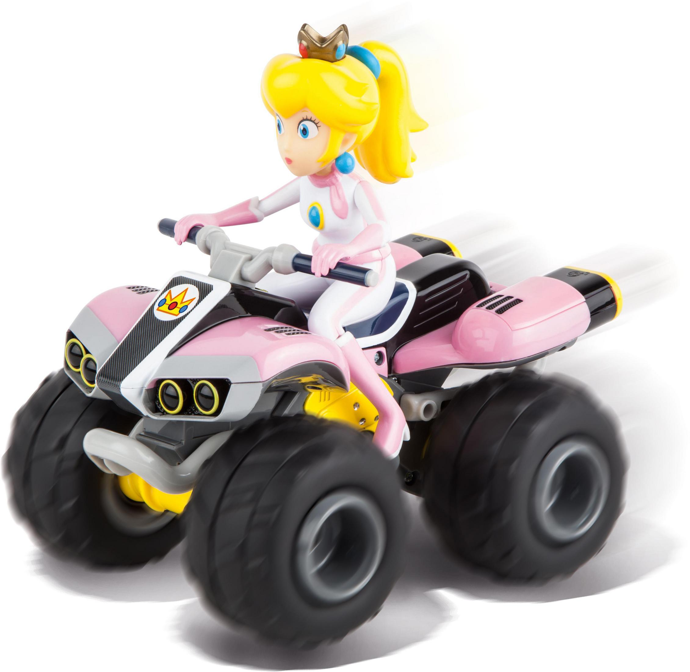Prinzessin Peach auf einem rosa ATV-Spielzeug. Das ATV hat große schwarze Reifen und gelbe Akzente.