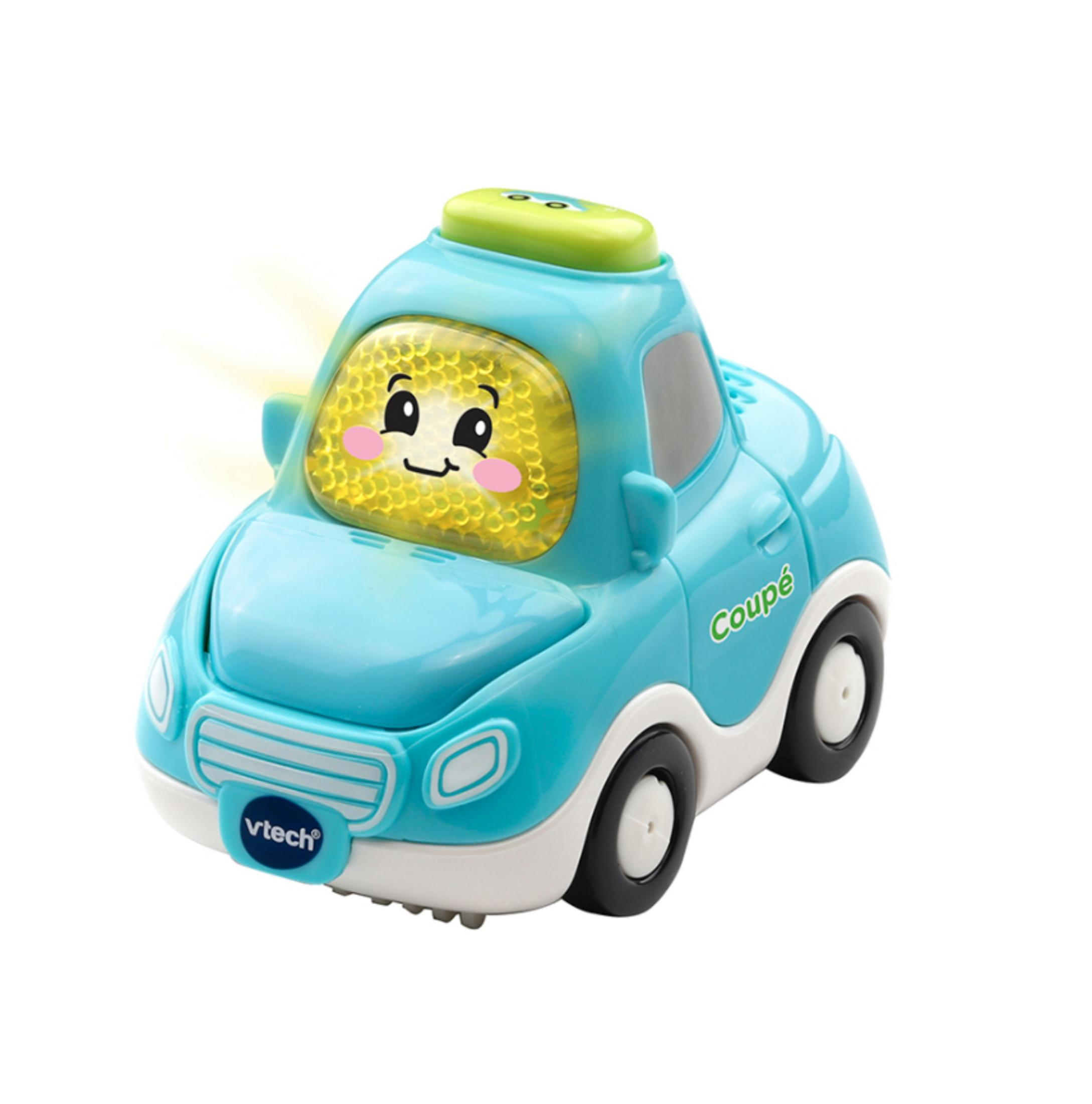 Ein blaues Spielzeugauto mit einem lächelnden Gesicht. Die Oberseite ist grün. Es ist ein Coupé.