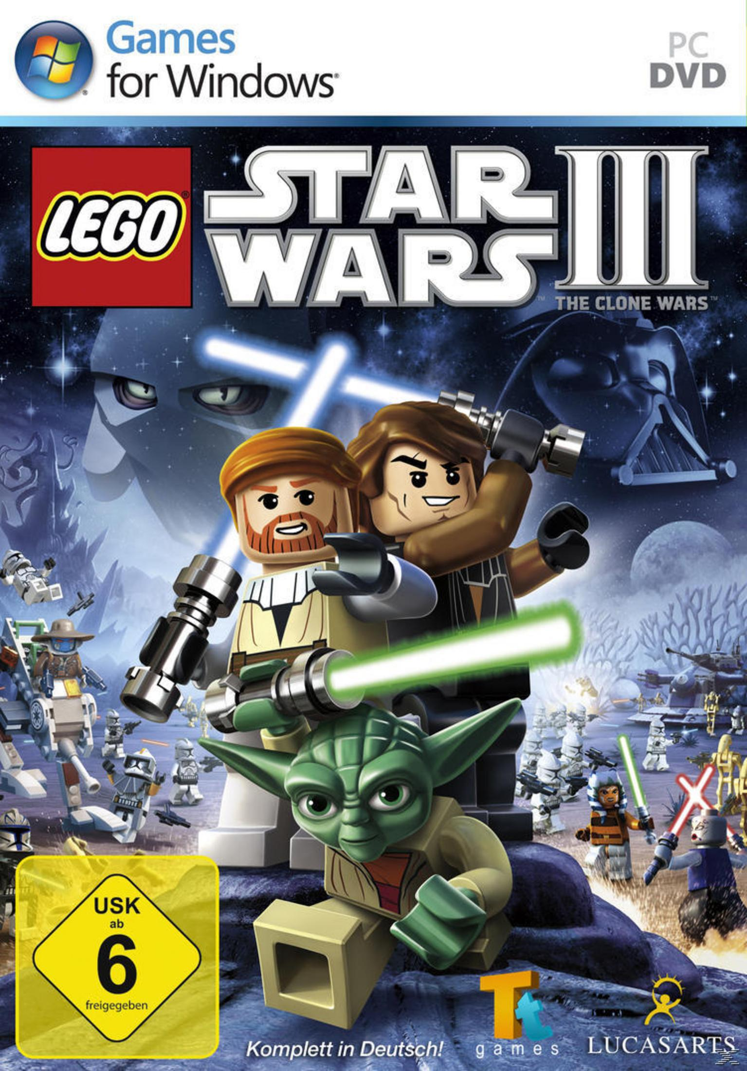Lego Star Wars III Spielbox. Enthält Lego-Figuren von Yoda, Anakin, Obi-Wan und Darth Vader.