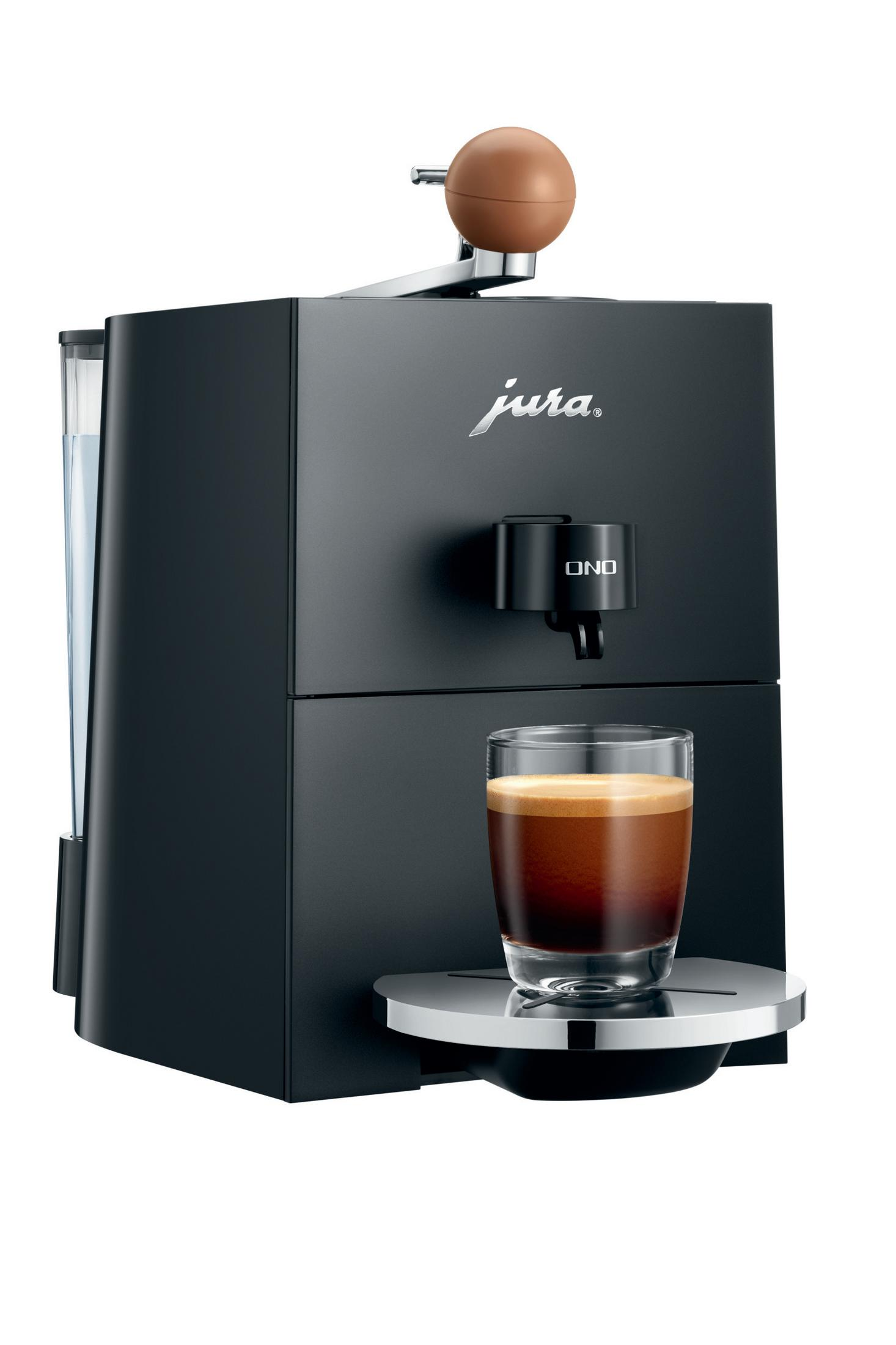 Schwarze Jura Espressomaschine. Glas mit Kaffee an der Seite.