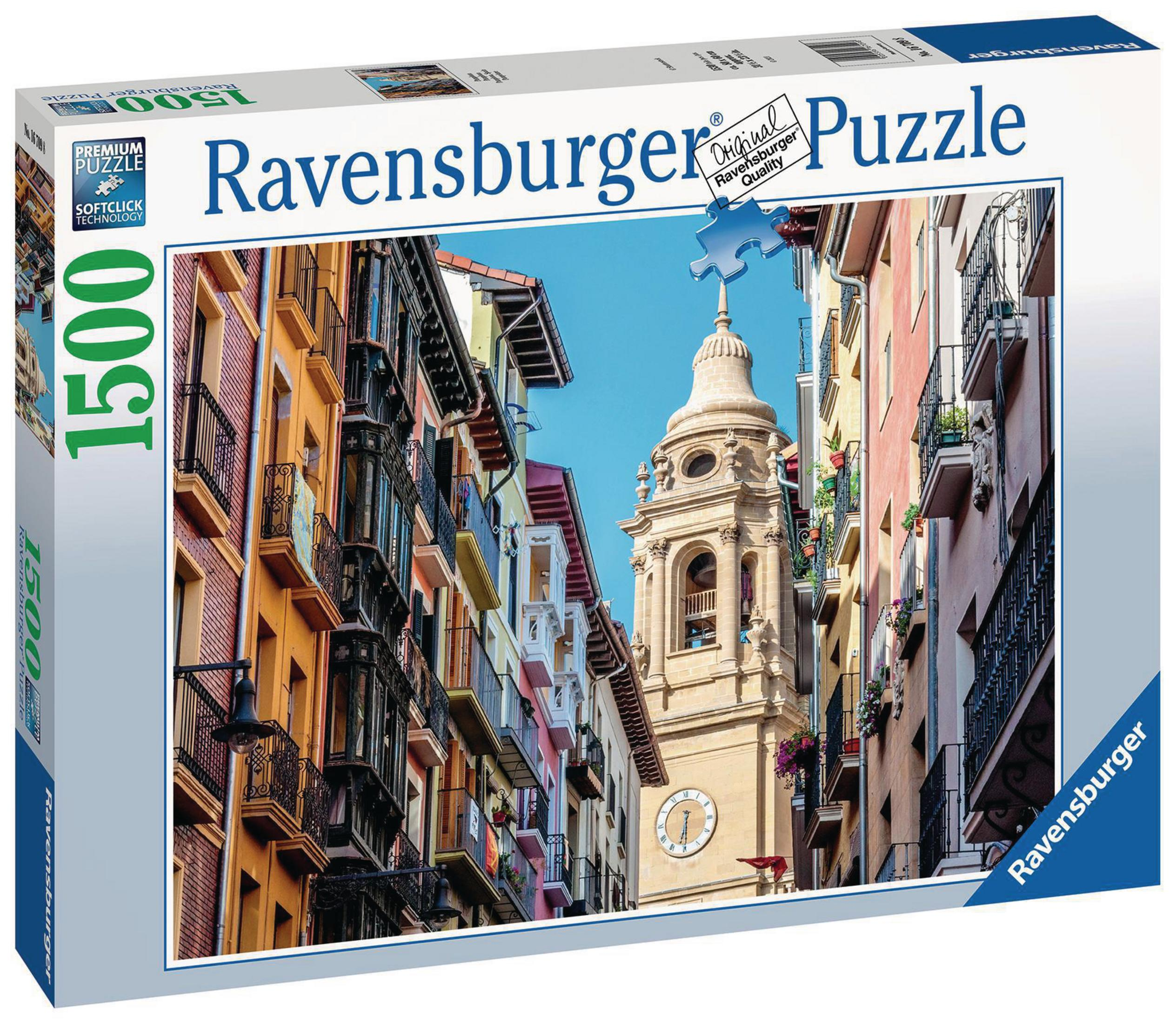 Scatola puzzle mostra scena stradale con edifici colorati e un campanile.