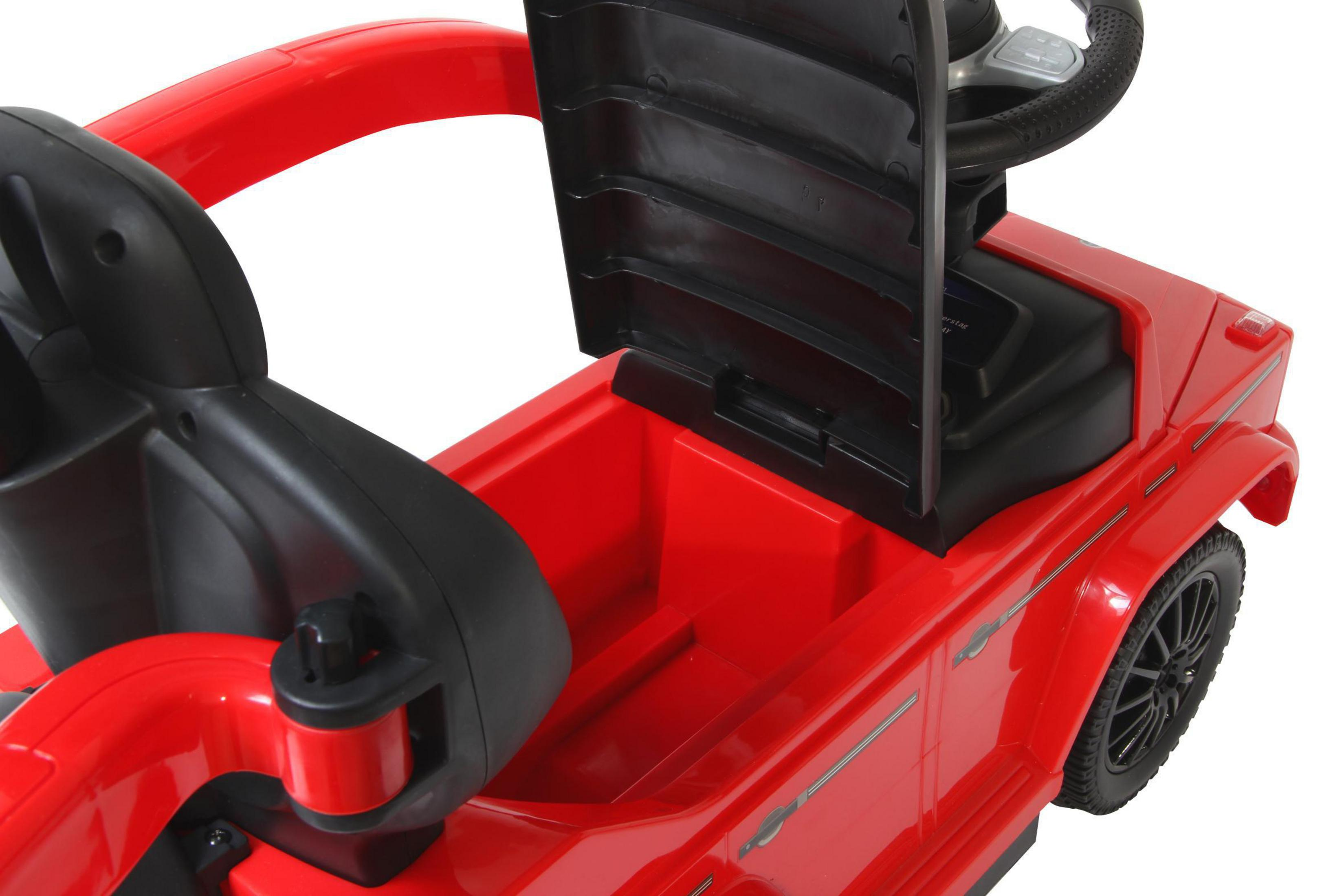 Ein rotes Spielzeugauto mit schwarzem Innenraum und Lenkrad. Es ist ein Kinderspielzeug.