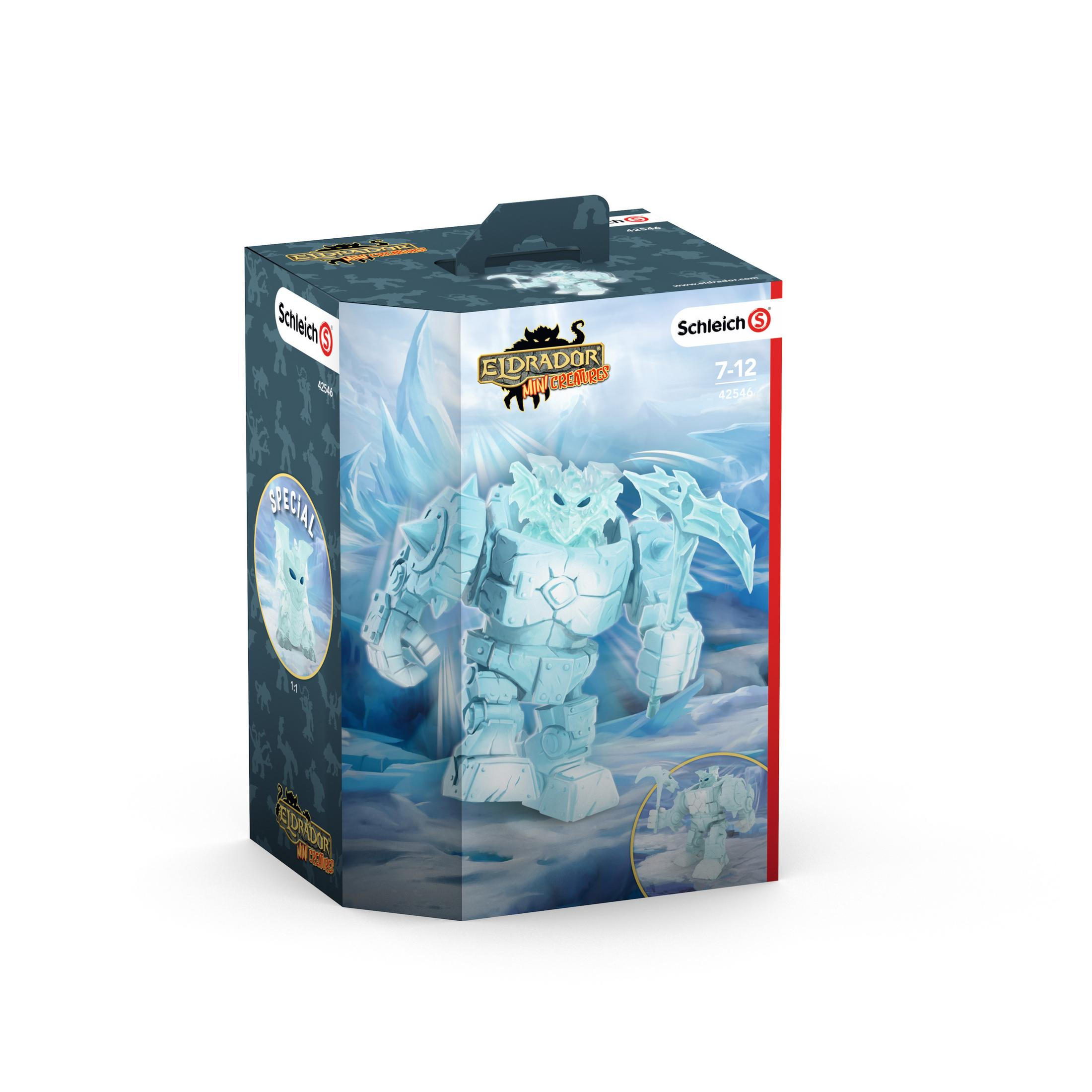 Eine Spielzeugbox mit einer blauen Monsterfigur in einer Box mit schneebedeckter Landschaft und einem Griff.