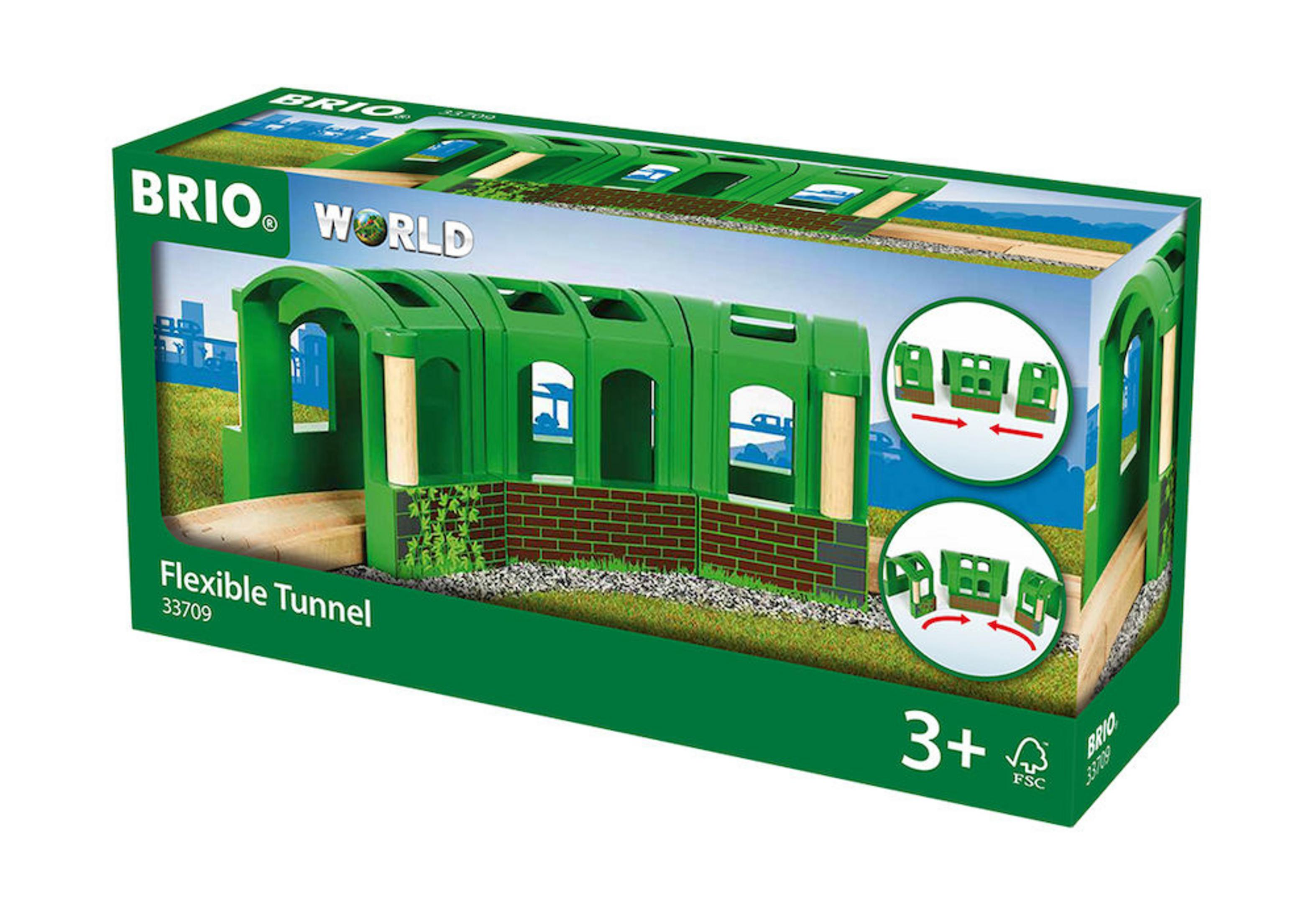 Eine Brio-Spielzeugkiste mit einem grünen, flexiblen Tunnel für eine Bahn. Anleitungen sind an der Seite.