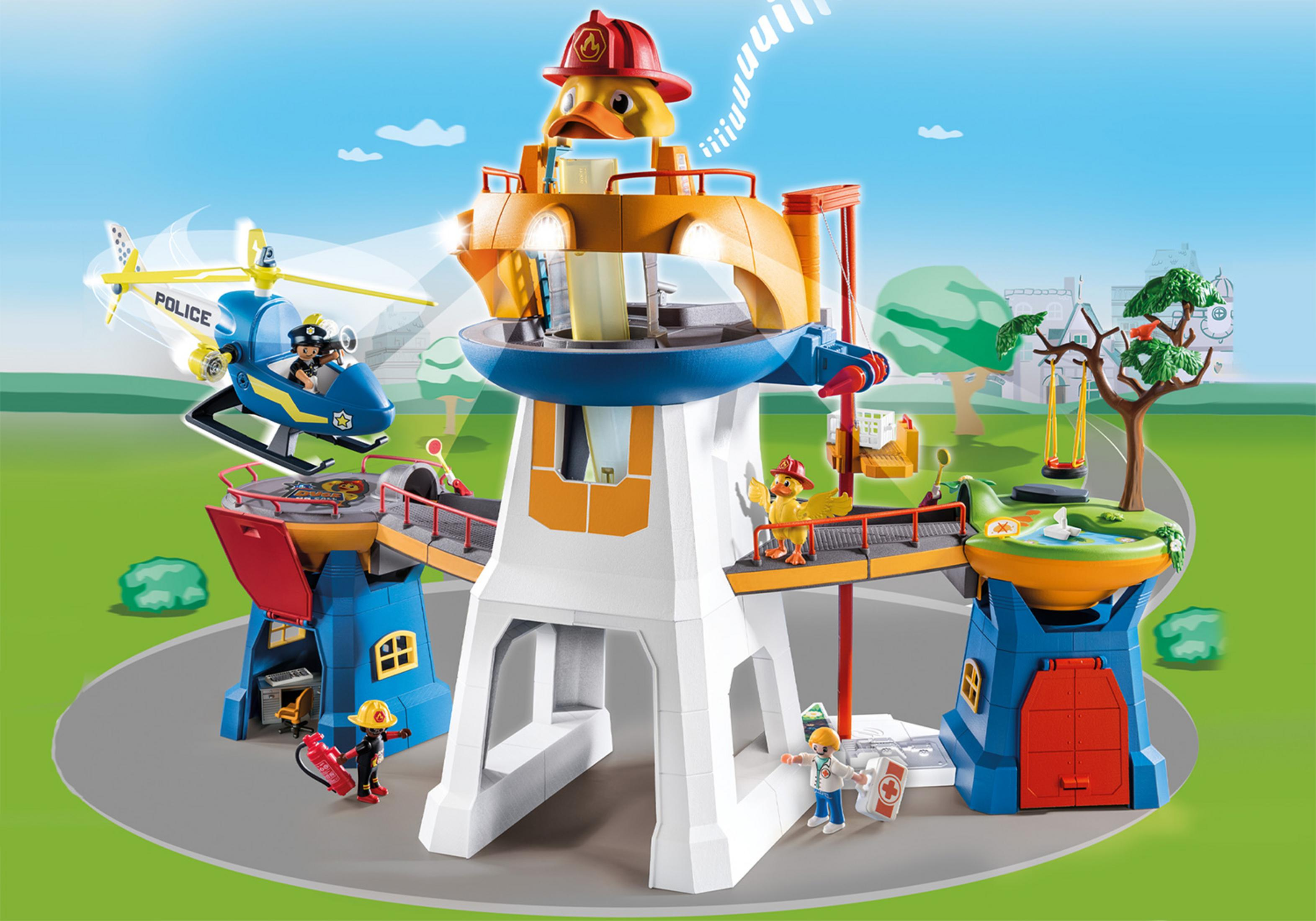 Playmobil-Spielset zum Thema Ente mit Hubschrauber, Figuren und einem Spielplatz in einer Parkumgebung.