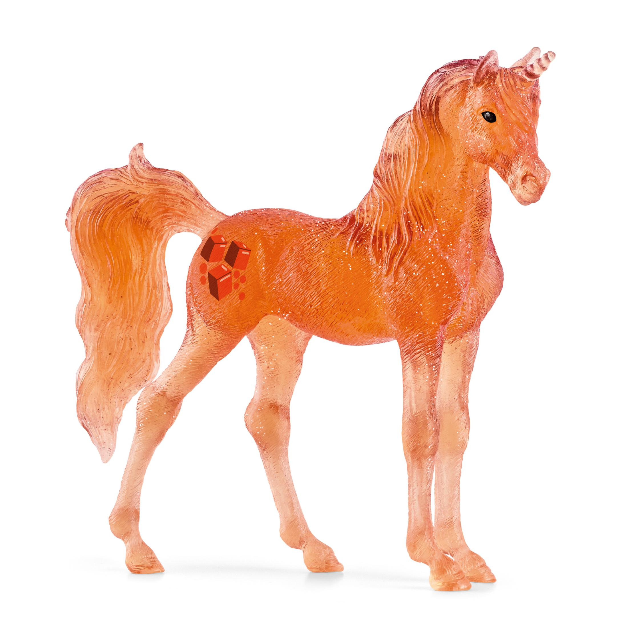 Orangenes Spielzeug-Einhorn mit glitzerndem Fell auf weißem Hintergrund.