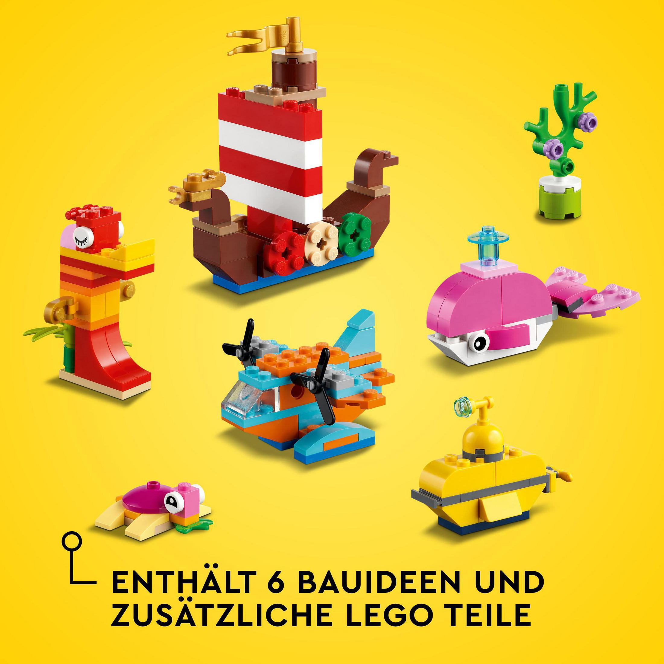 Diverse kleurrijke Lego zeedieren en een boot op een gele achtergrond.
