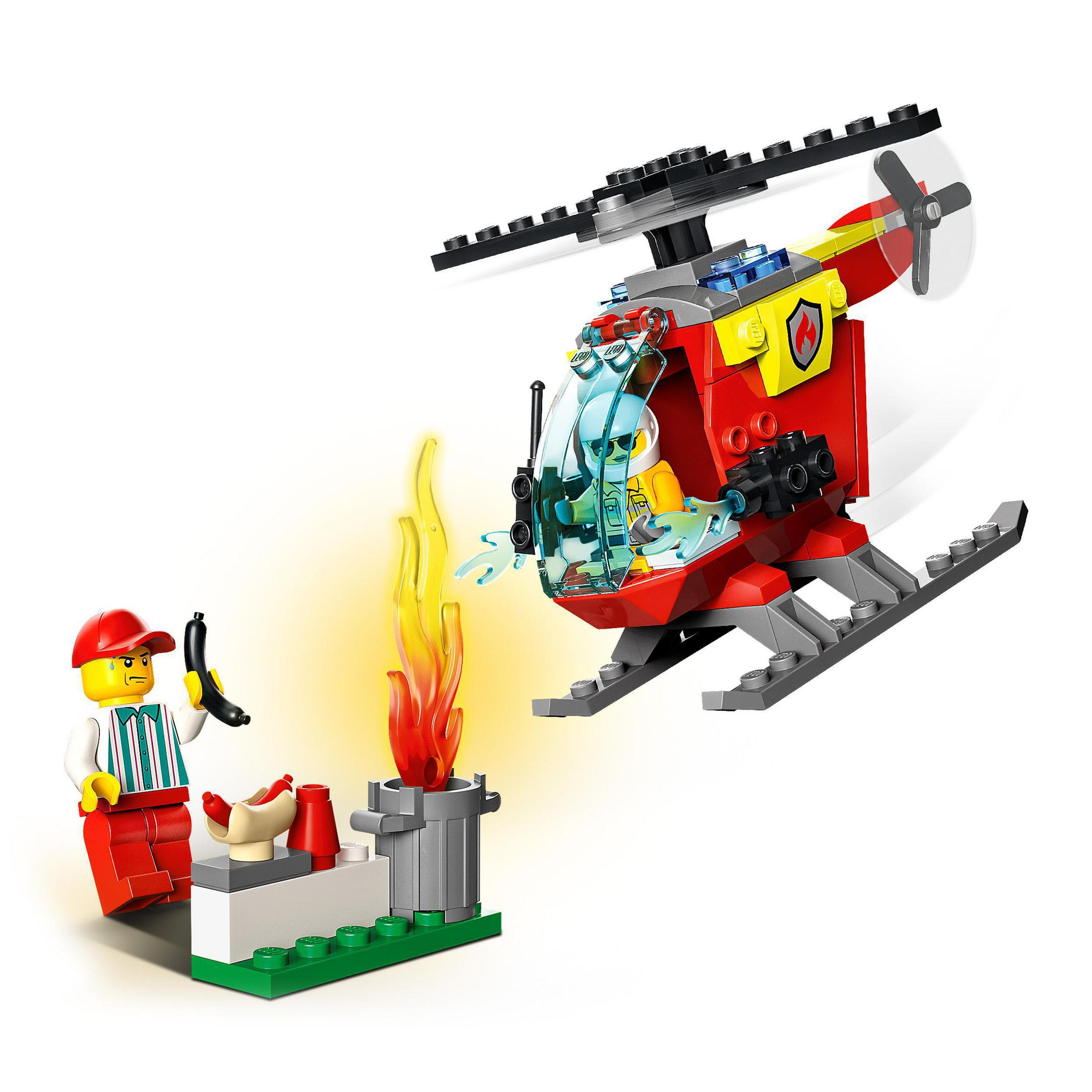 Lego-Set eines roten und gelben Hubschraubers mit Feuer und einem Mann am Hotdog-Stand.