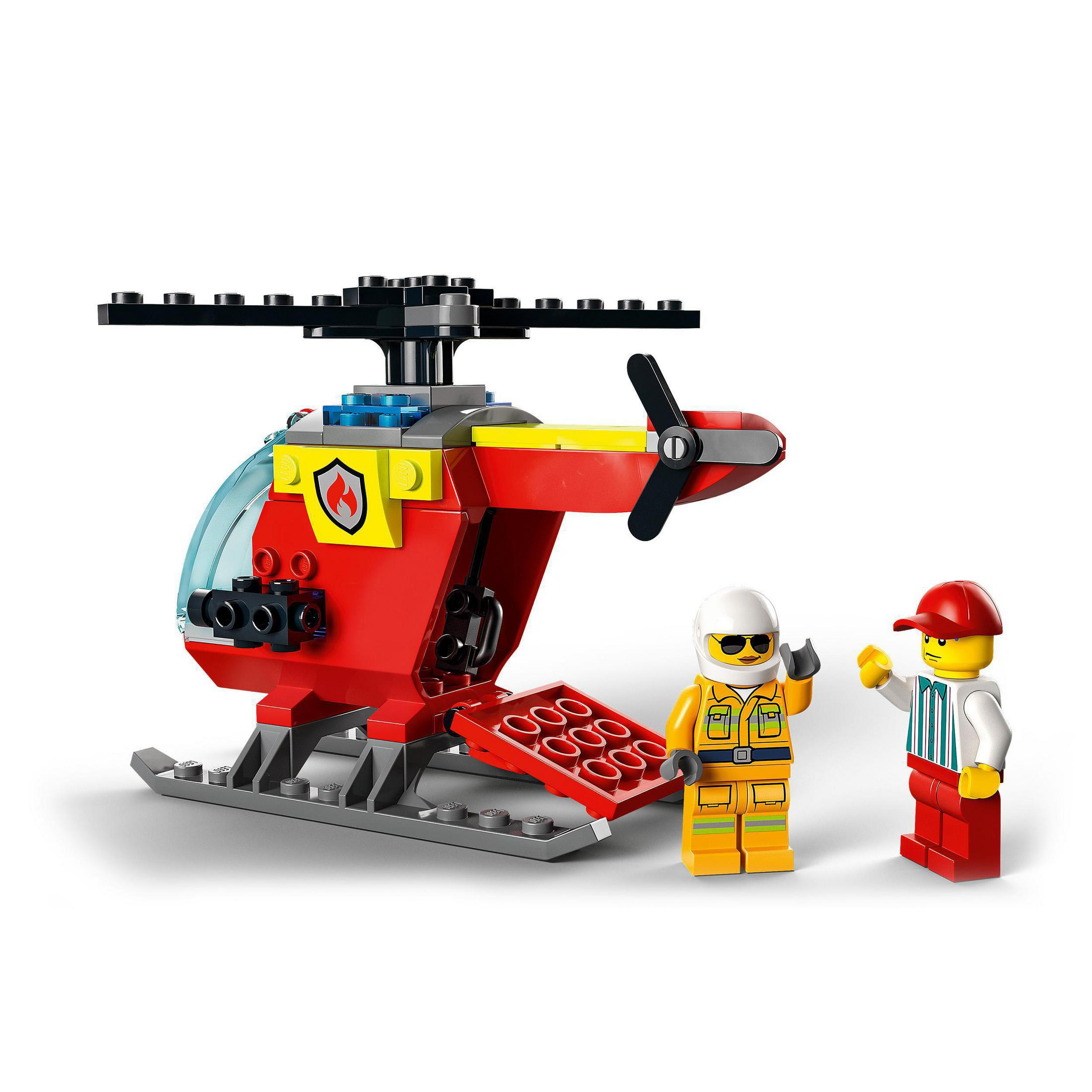 Lego-Hubschrauber und zwei Lego-Figuren. Roter und gelber Hubschrauber. Weißer Hintergrund.