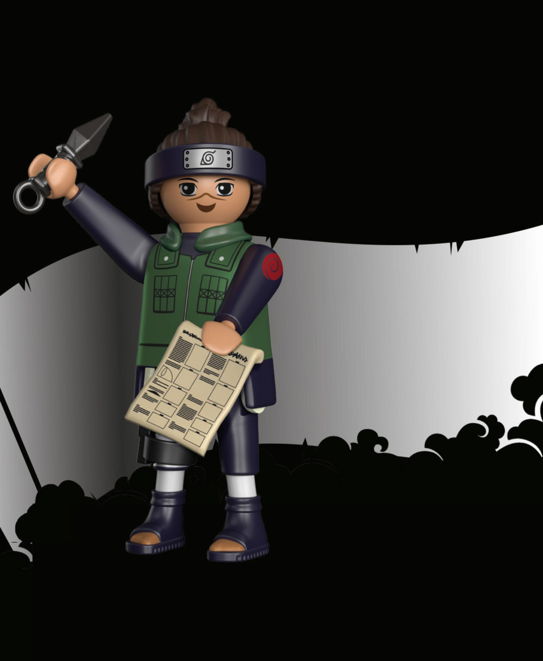 Personaggio Playmobil con arma e pergamena su sfondo bianco e nero.