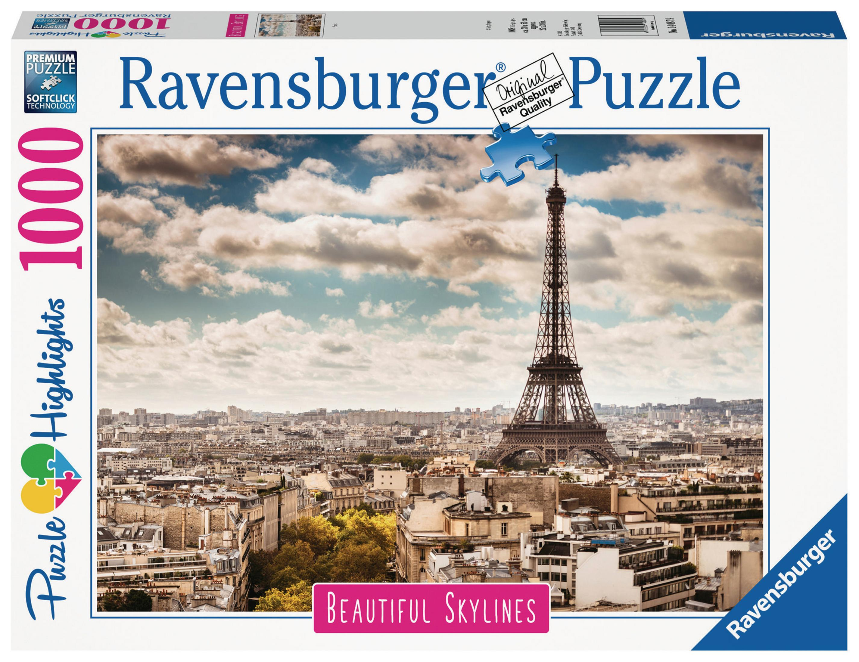 Pudełko puzzli Ravensburger. Wieża Eiffla w Paryżu, krajobraz miejski, pochmurne niebo.
