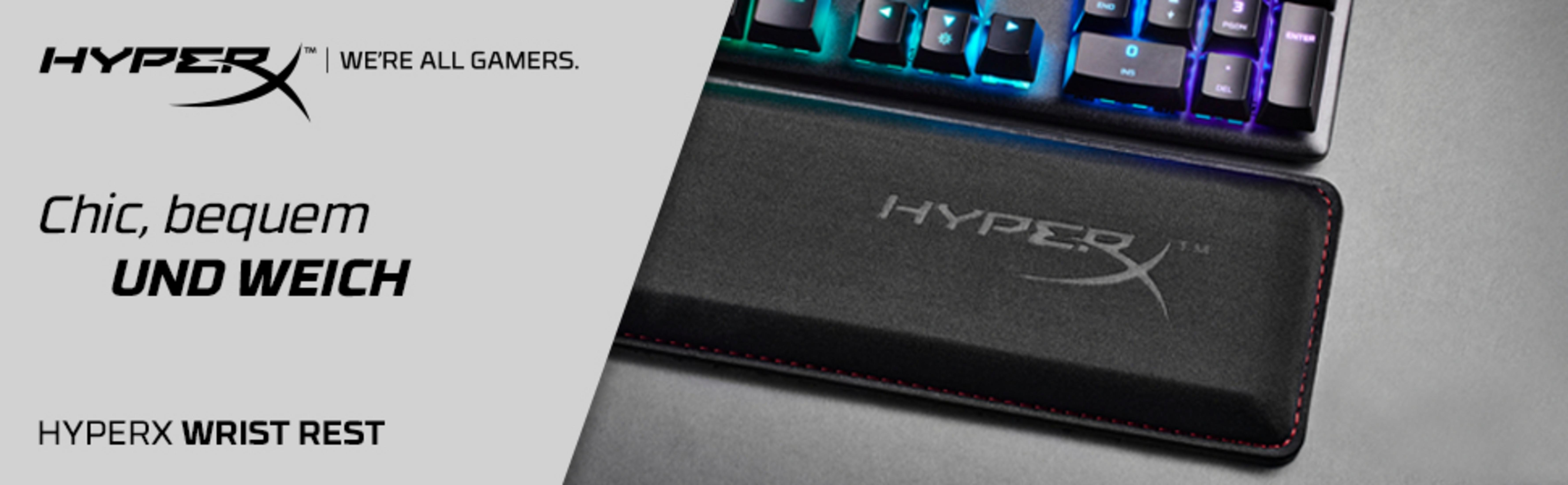 HyperX polssteun met toetsenbord. Zwarte steun met rode stiksels, toetsenbord met RGB-verlichting.