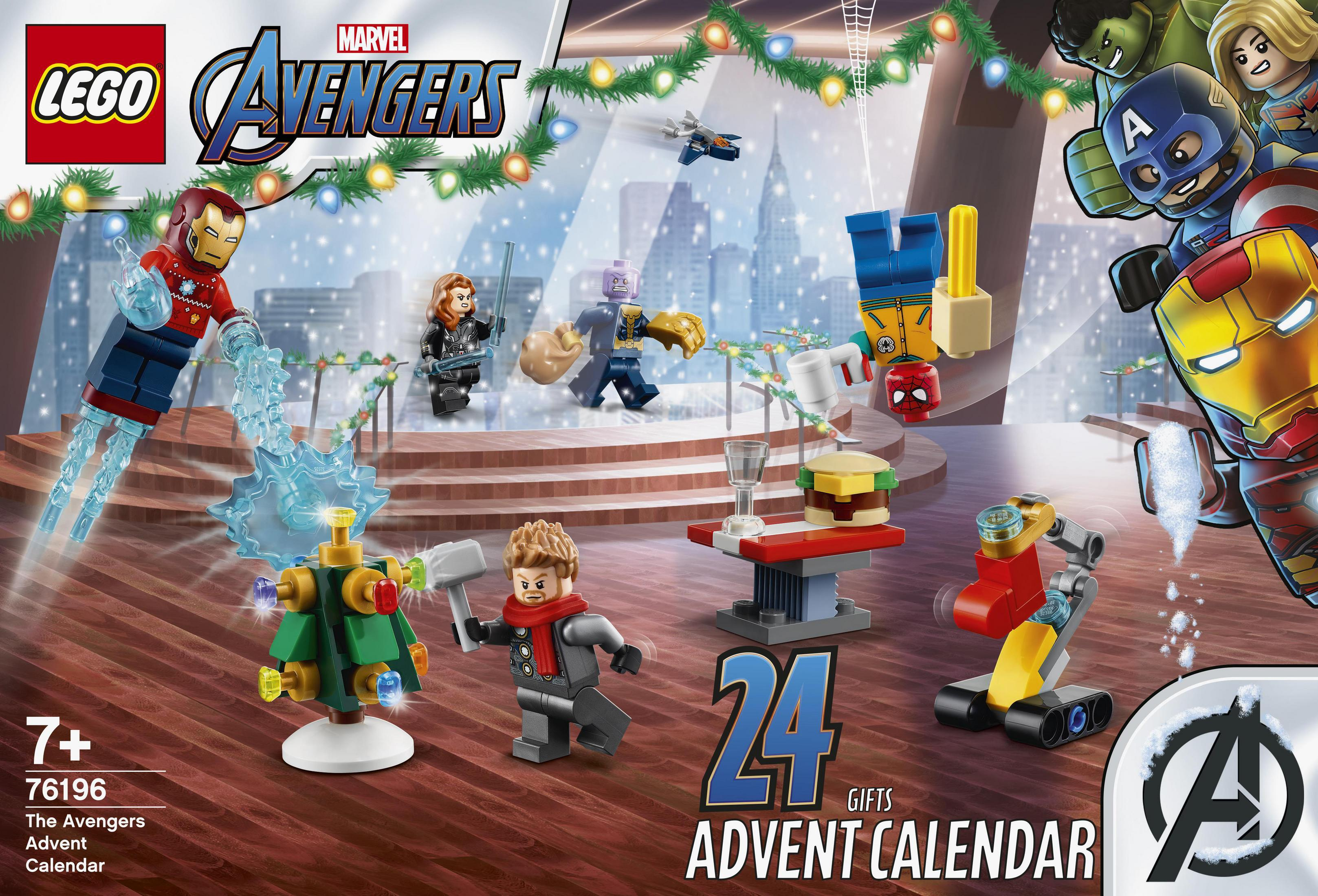 Pudełko kalendarza adwentowego Lego Avengers przedstawiające figurki Lego i choinkę na tle śnieżnej scenerii.