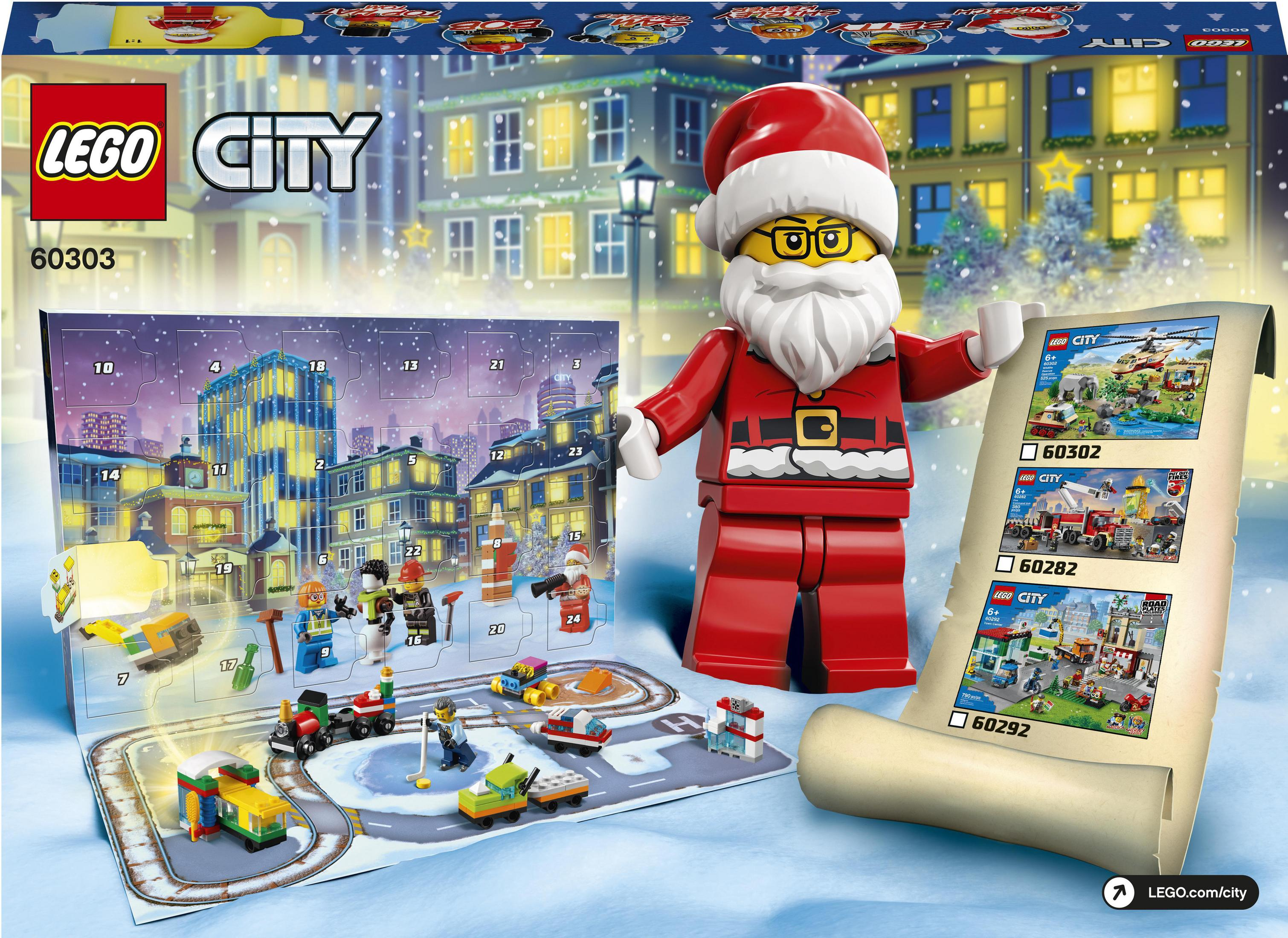 Eine Lego City Adventskalender-Szene. Weihnachtsmann und andere Figuren in Schneelandschaft.