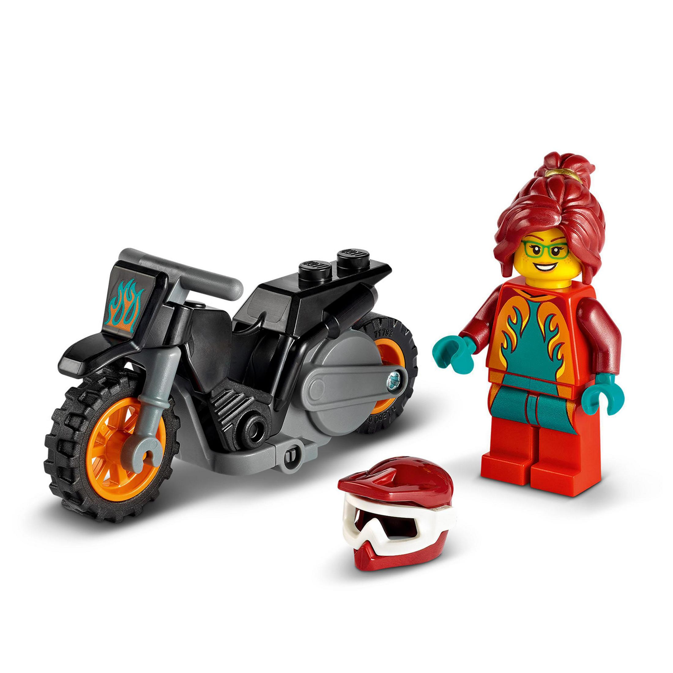 Ein Lego-Motorrad und eine Minifigur mit Helm auf weißem Hintergrund.