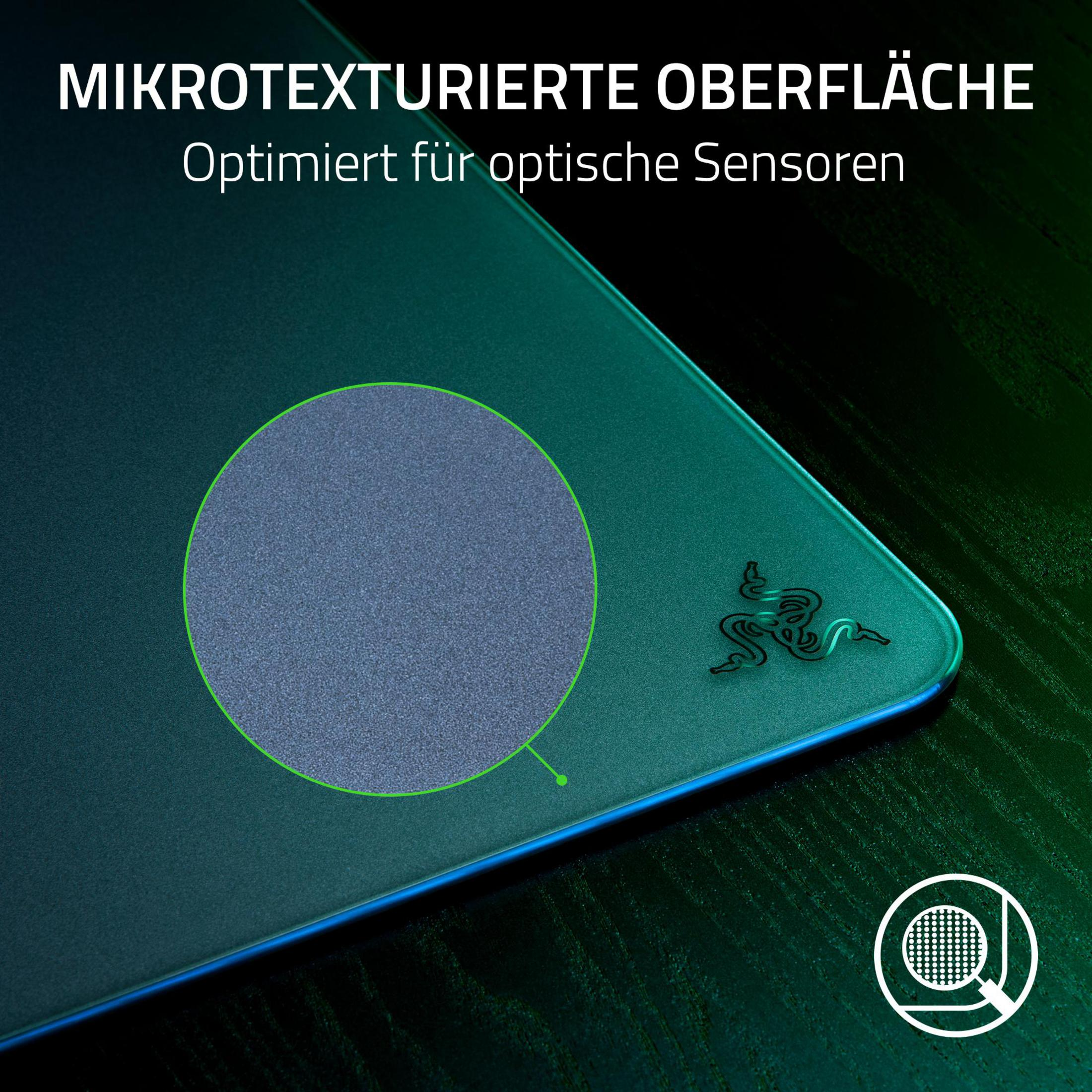Podkładka pod mysz z zielono-czarnym wzorem. Tekst brzmi 'Mikrotexturierte Oberfläche'. Posiada logo Razer.