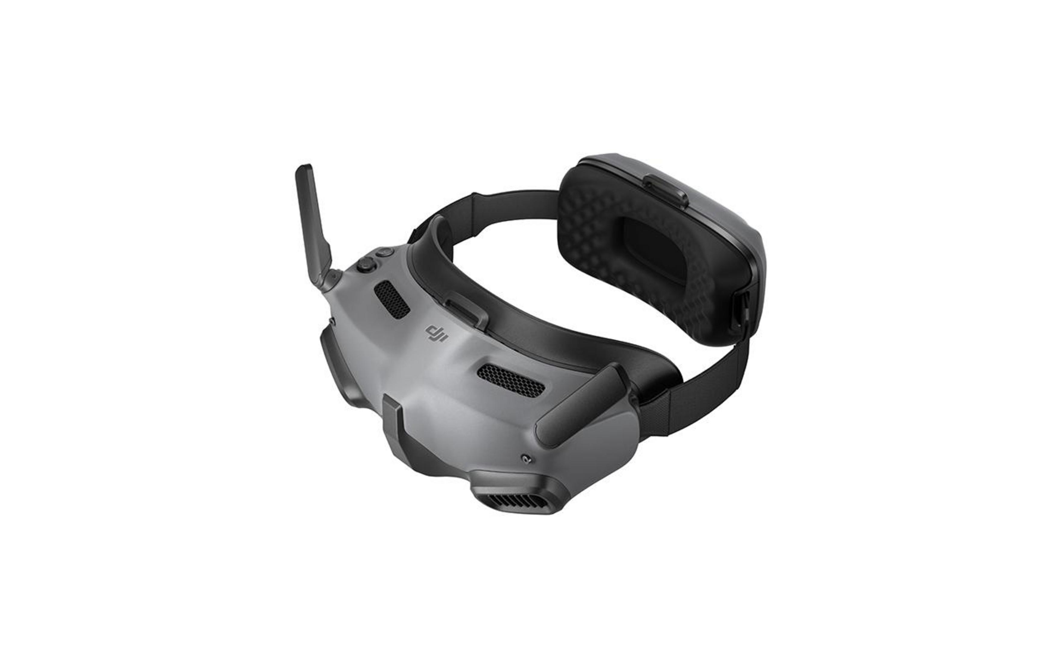 DJI FPV Brille, grau und schwarz, angewinkelt, zeigt die Vorderseite mit Luftschlitzen und Stirnband.