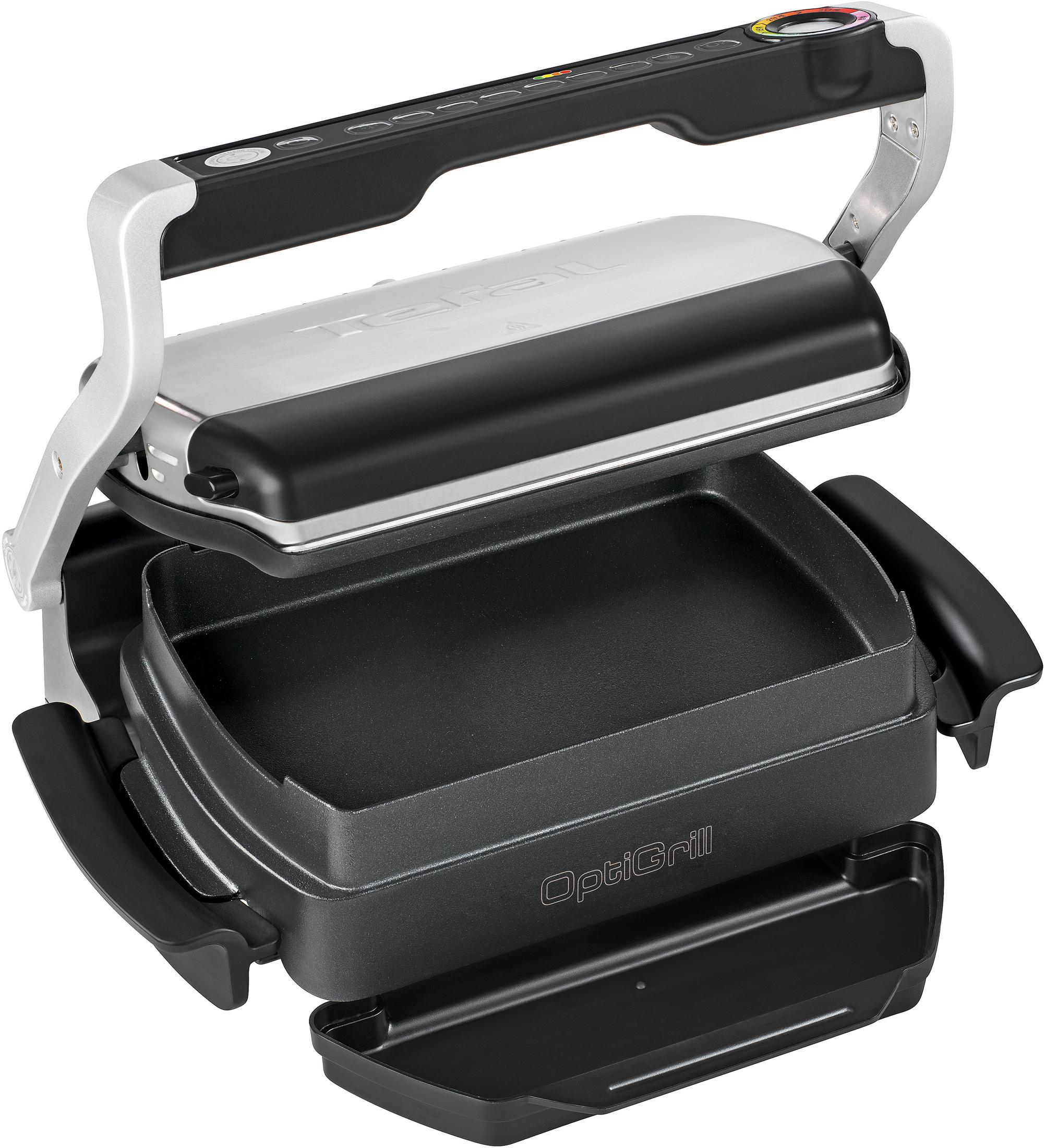 Tefal OptiGrill, ein schwarzer und silberner Grill mit geöffnetem Deckel und herausnehmbarer Schale.
