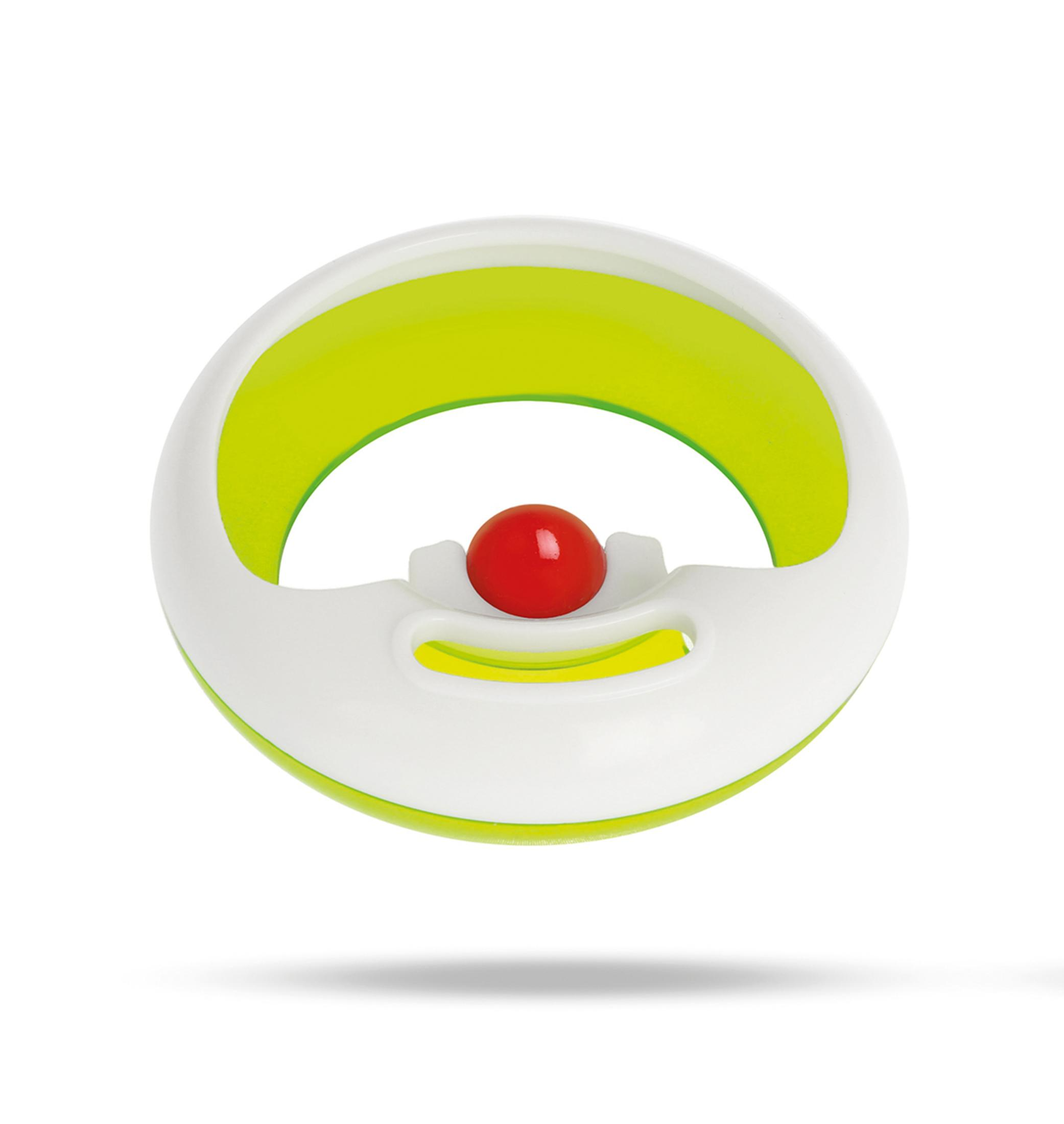 Ein weißes und grünes Spielzeug mit einem roten Ball in der Mitte.