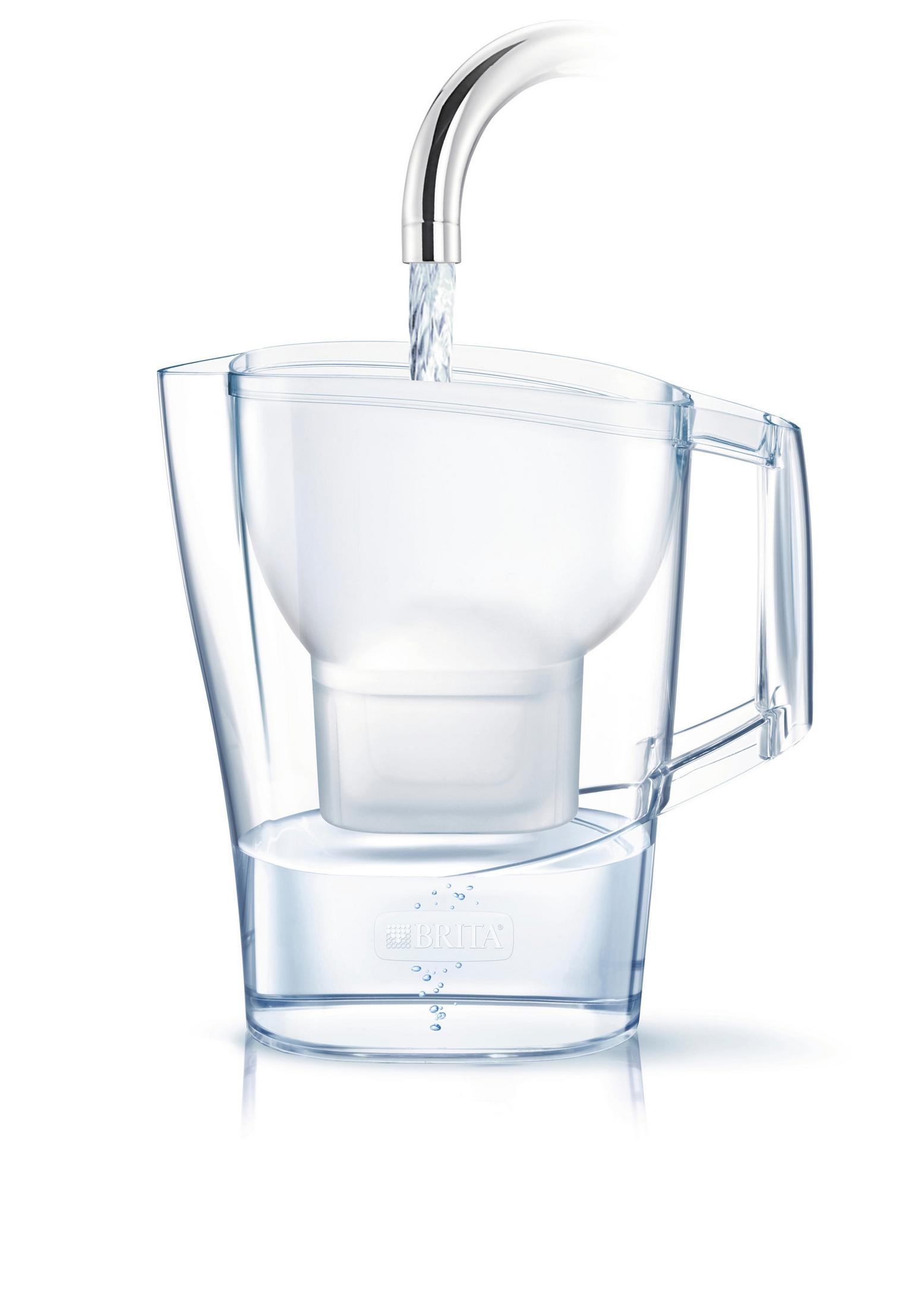 A clear water filter pitcher with water pouring into it from a metallic faucet.