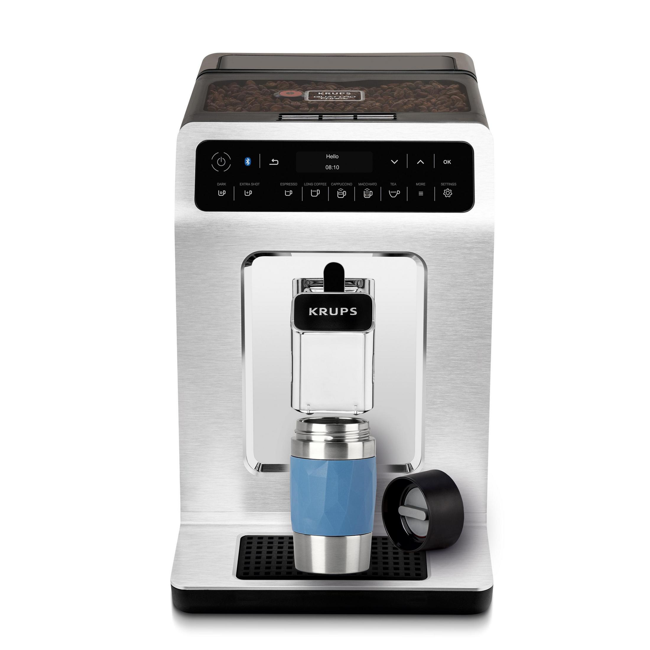 Silber-schwarze Krups Kaffeemaschine mit einem Reisebecher. Digitalanzeige und Knöpfe.