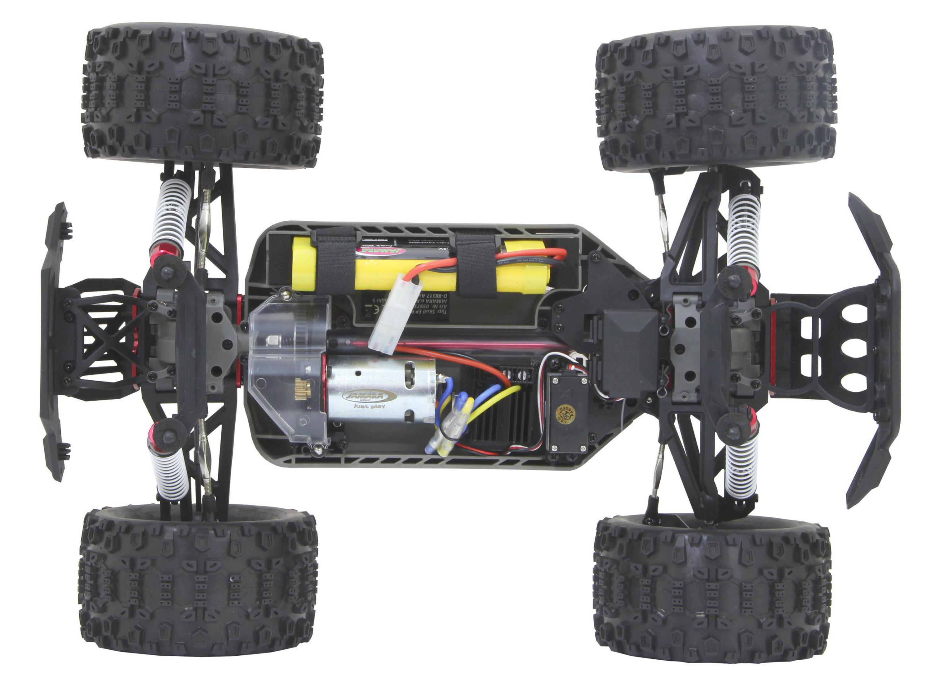 Die Unterseite eines schwarzen Spielzeug-Monstertrucks mit sichtbaren Komponenten.