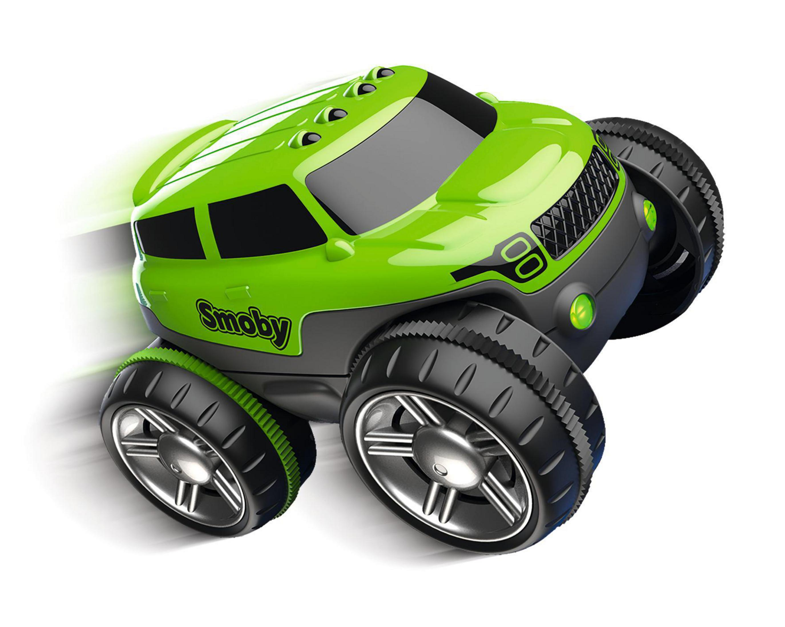 Grünes Spielzeugauto mit großen Rädern, fährt auf weißem Hintergrund.