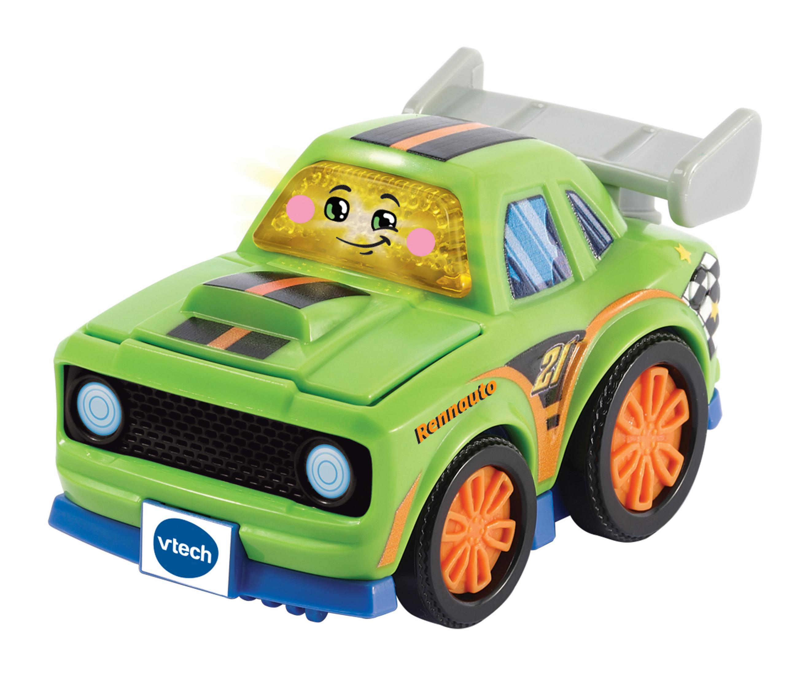 Coche de carreras de juguete verde con ruedas naranjas, una franja negra y una cara sonriente.