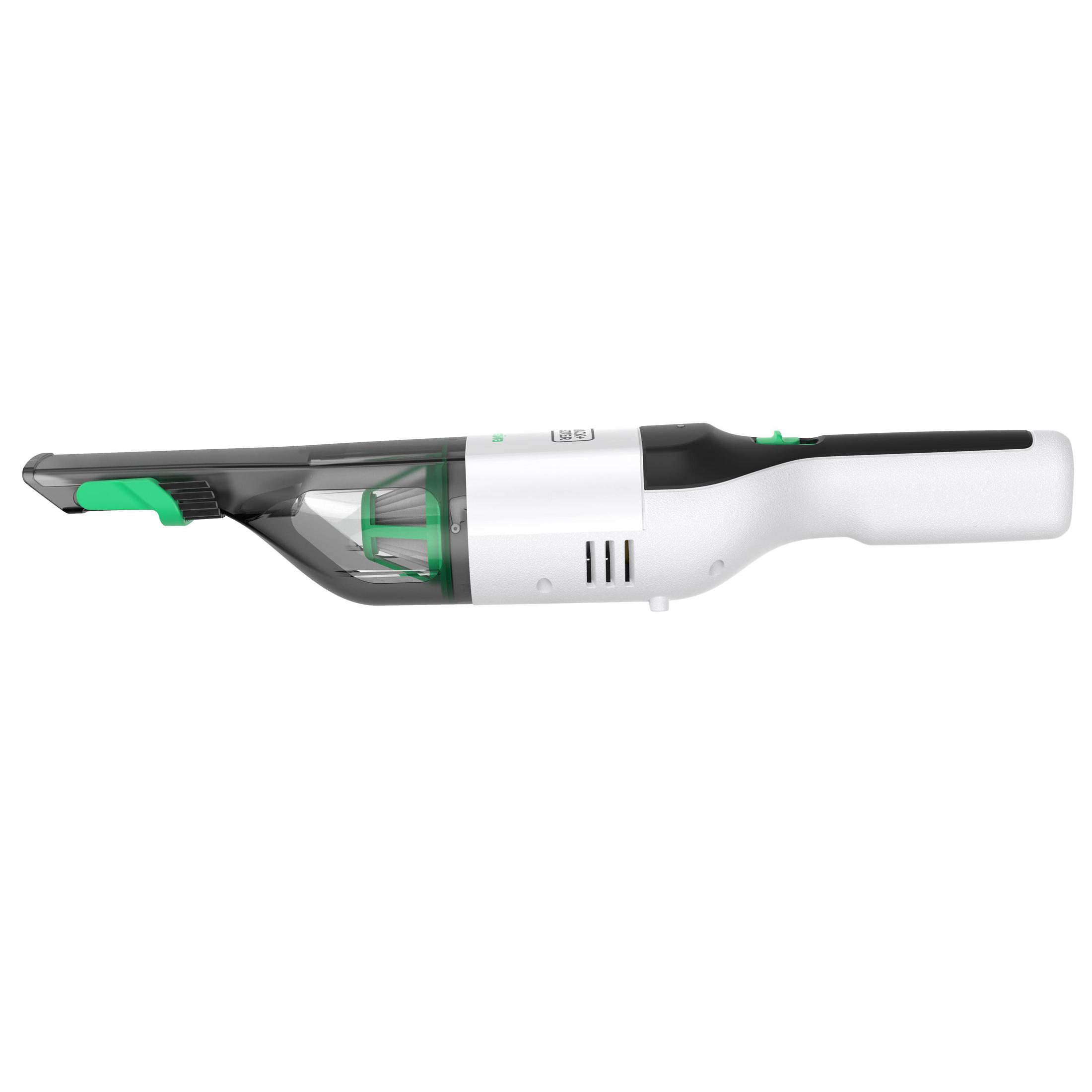 Un aspirateur à main blanc et noir avec un bouton et des accents verts, vue de dessus, isolé sur blanc.