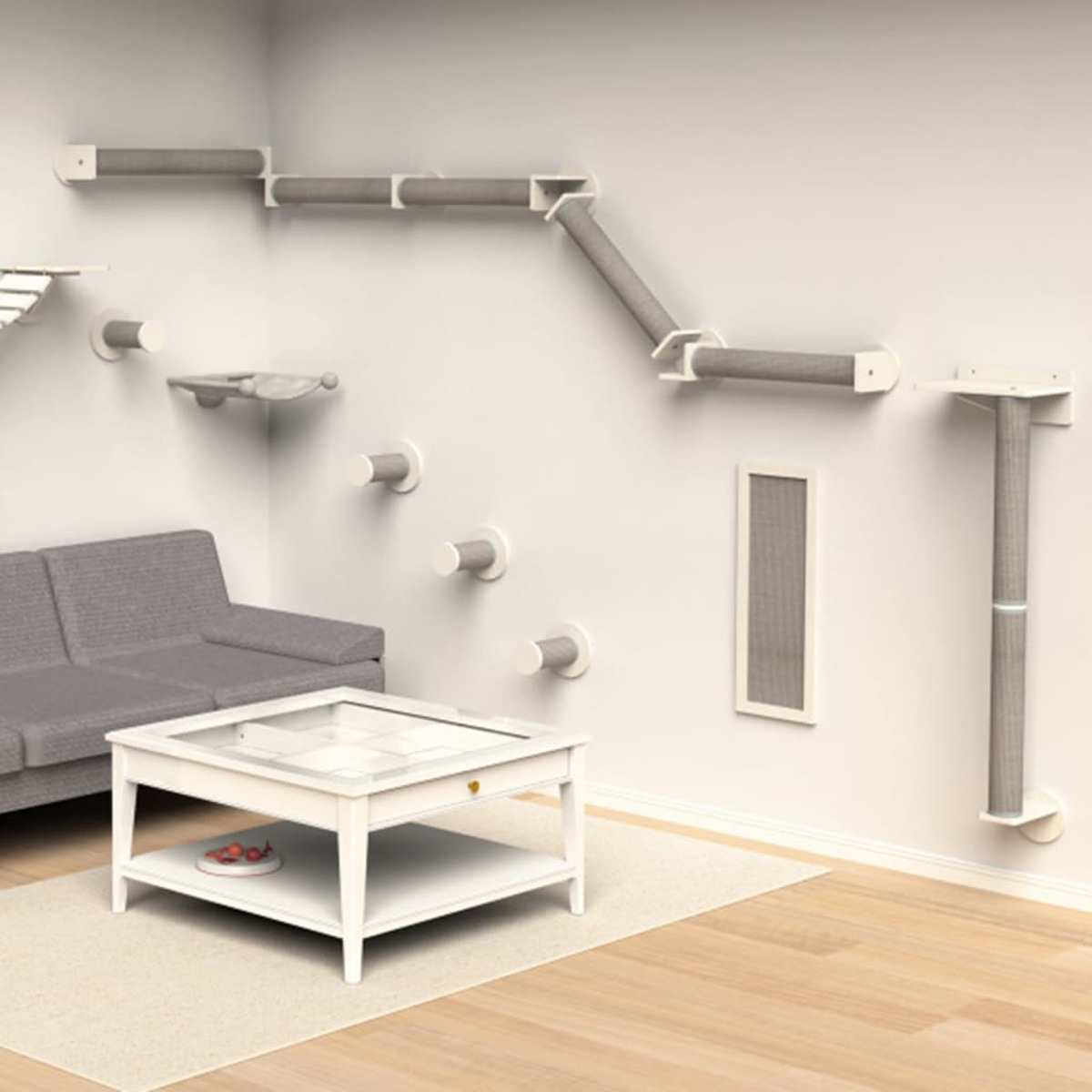 Una estructura para escalar gatos montada en una pared blanca. Un sofá y una mesa en primer plano.