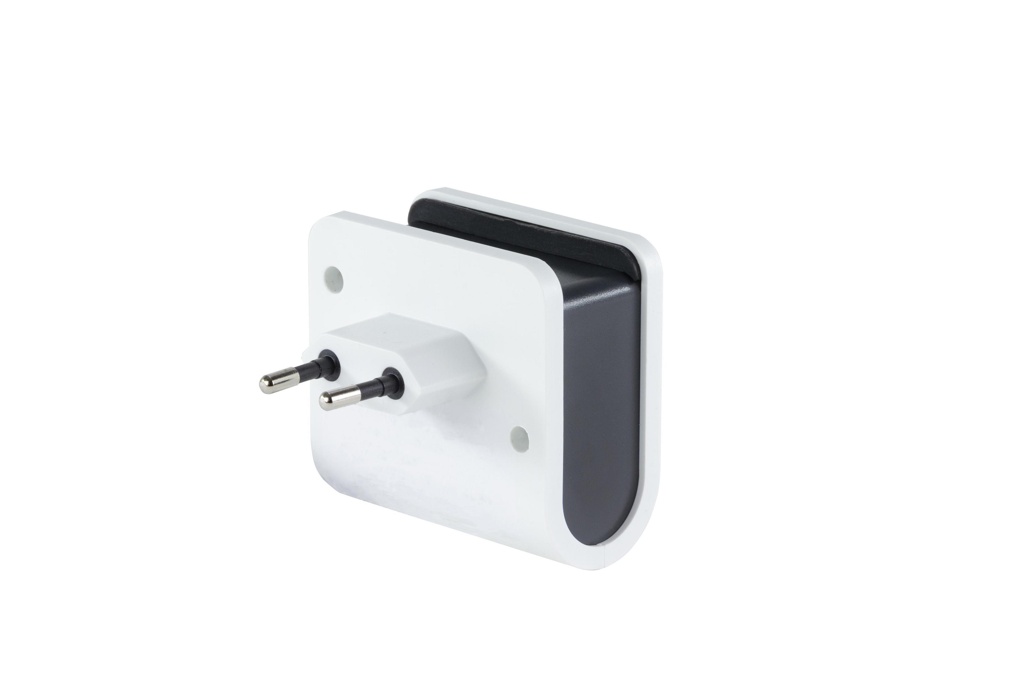 Ein weiß-schwarzer Adapter mit zwei Stiften und einem schwarzen Rand. Es ist auf weißem Hintergrund.