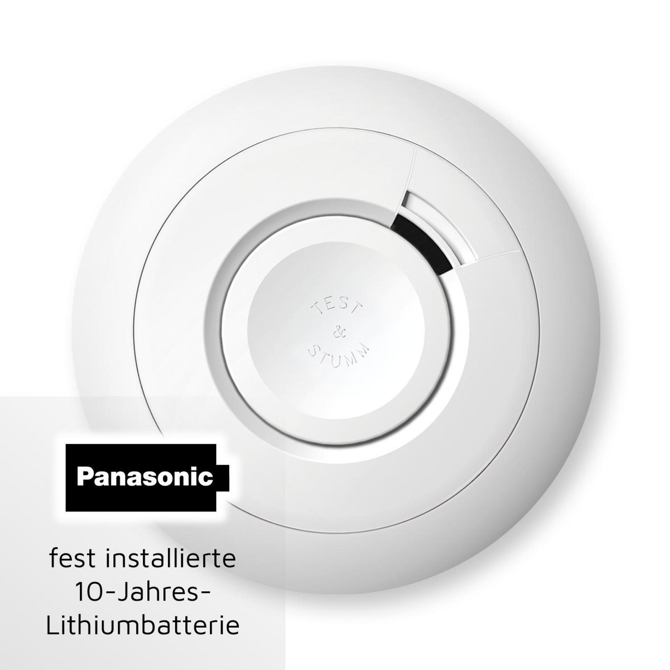 Un detector de humo blanco y circular con un centro negro y la marca Panasonic.