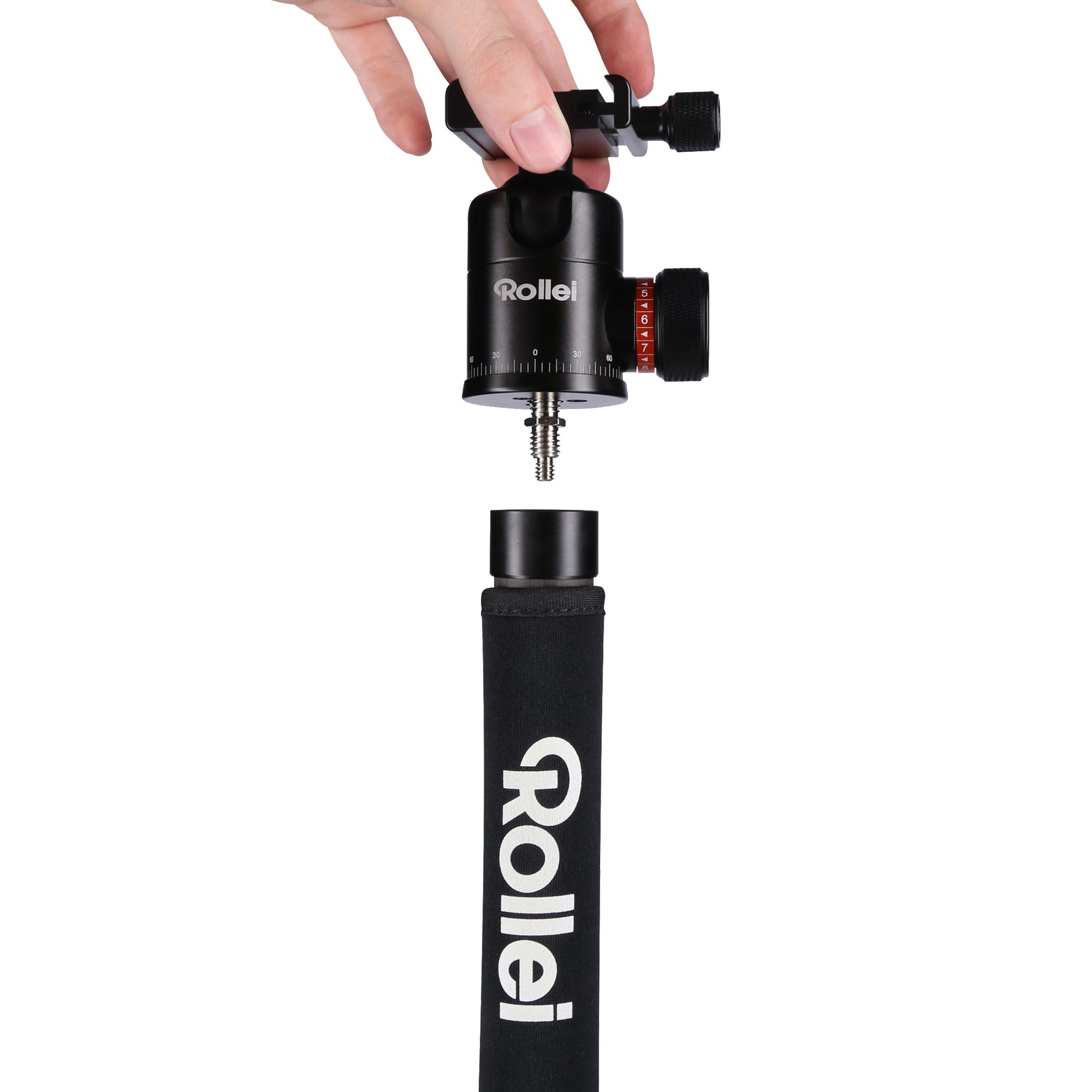 Głowica statywu mocowana do czarnego statywu.